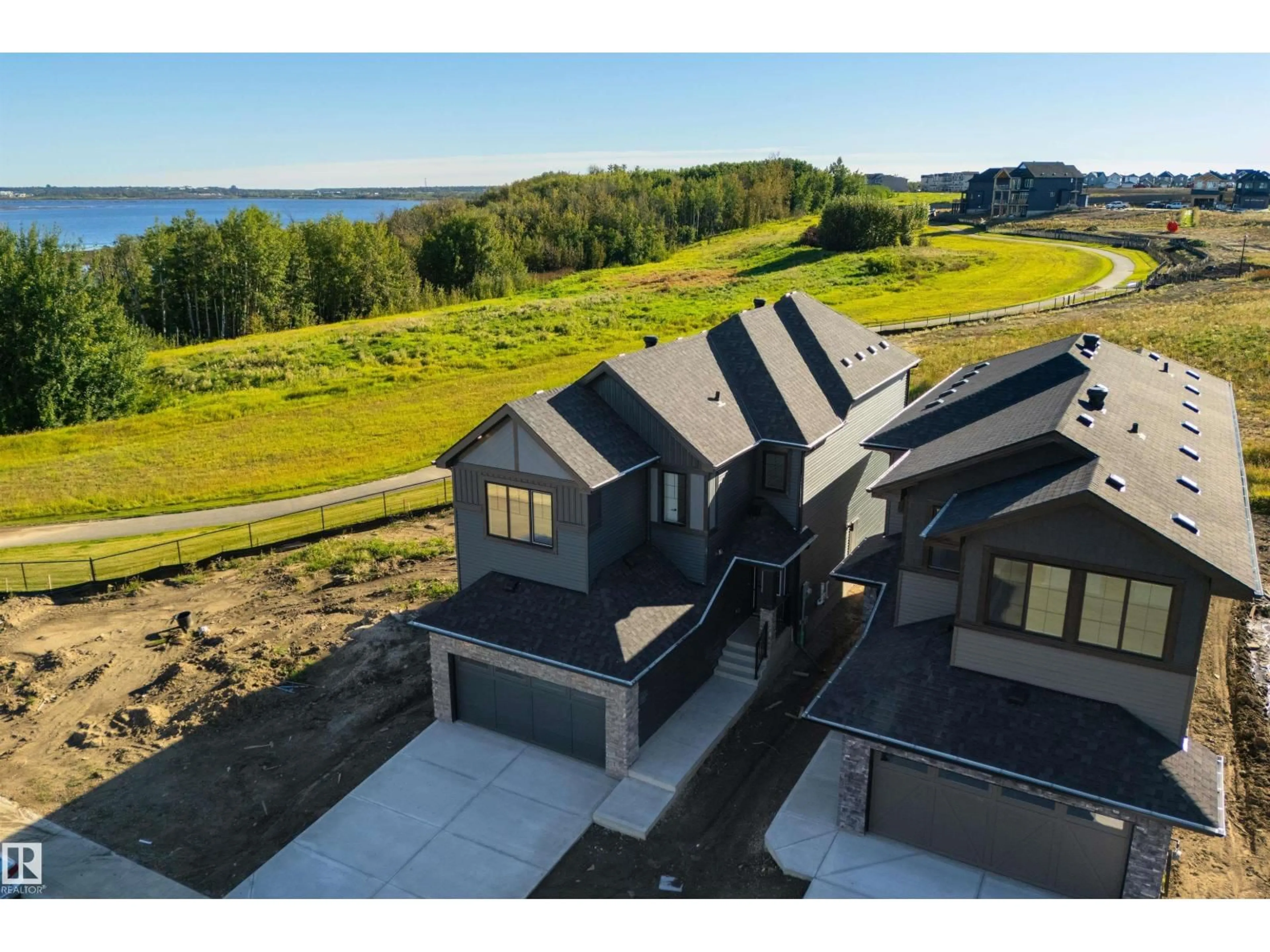 A pic from outside/outdoor area/front of a property/back of a property/a pic from drone, water/lake/river/ocean view for NW - 1311 HAWKS RIDGE LINK, Edmonton Alberta T5S0X5