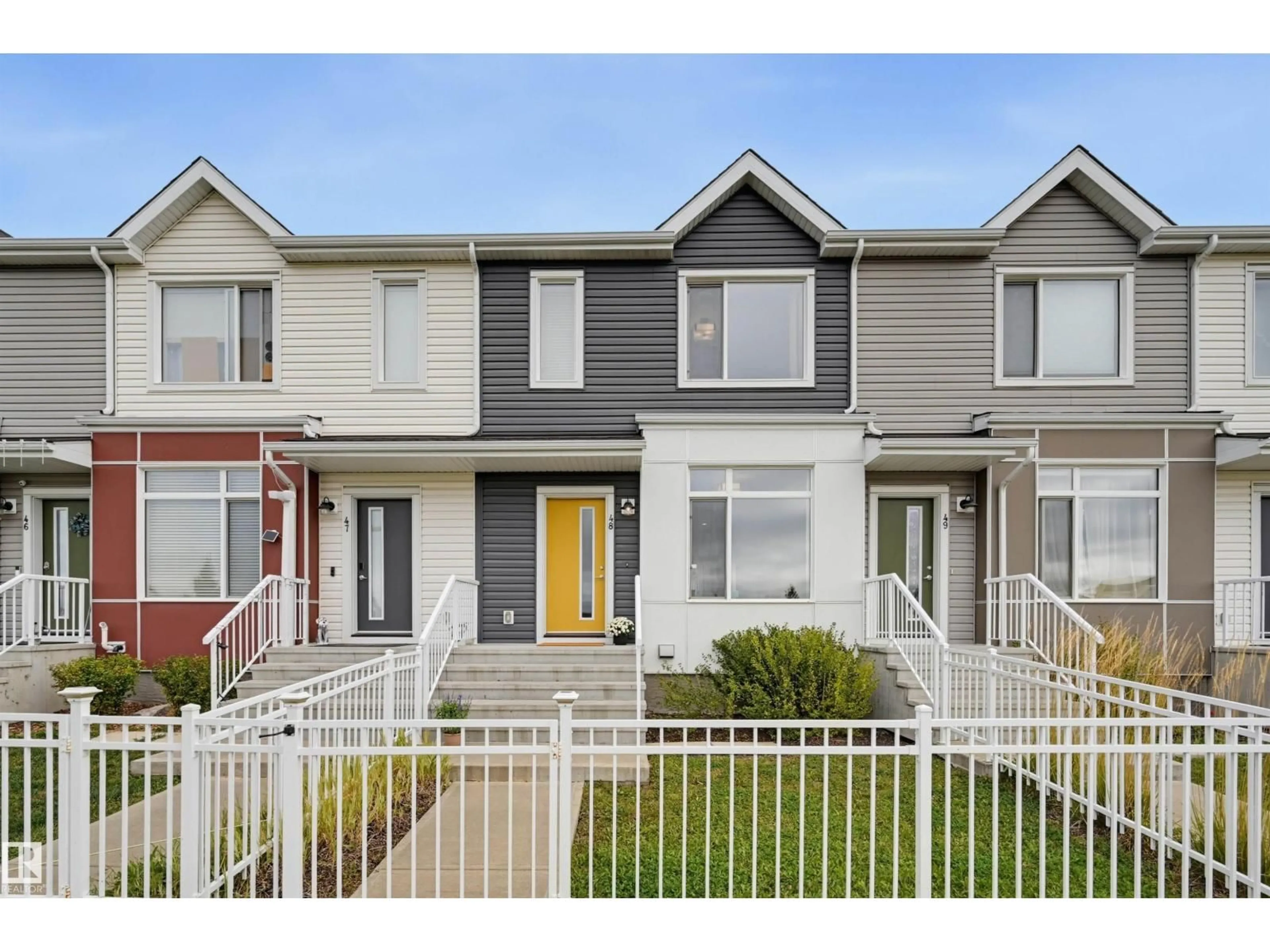 Home with vinyl exterior material, street for 48 215 SADDLEBACK RD, Edmonton Alberta T6J5T6