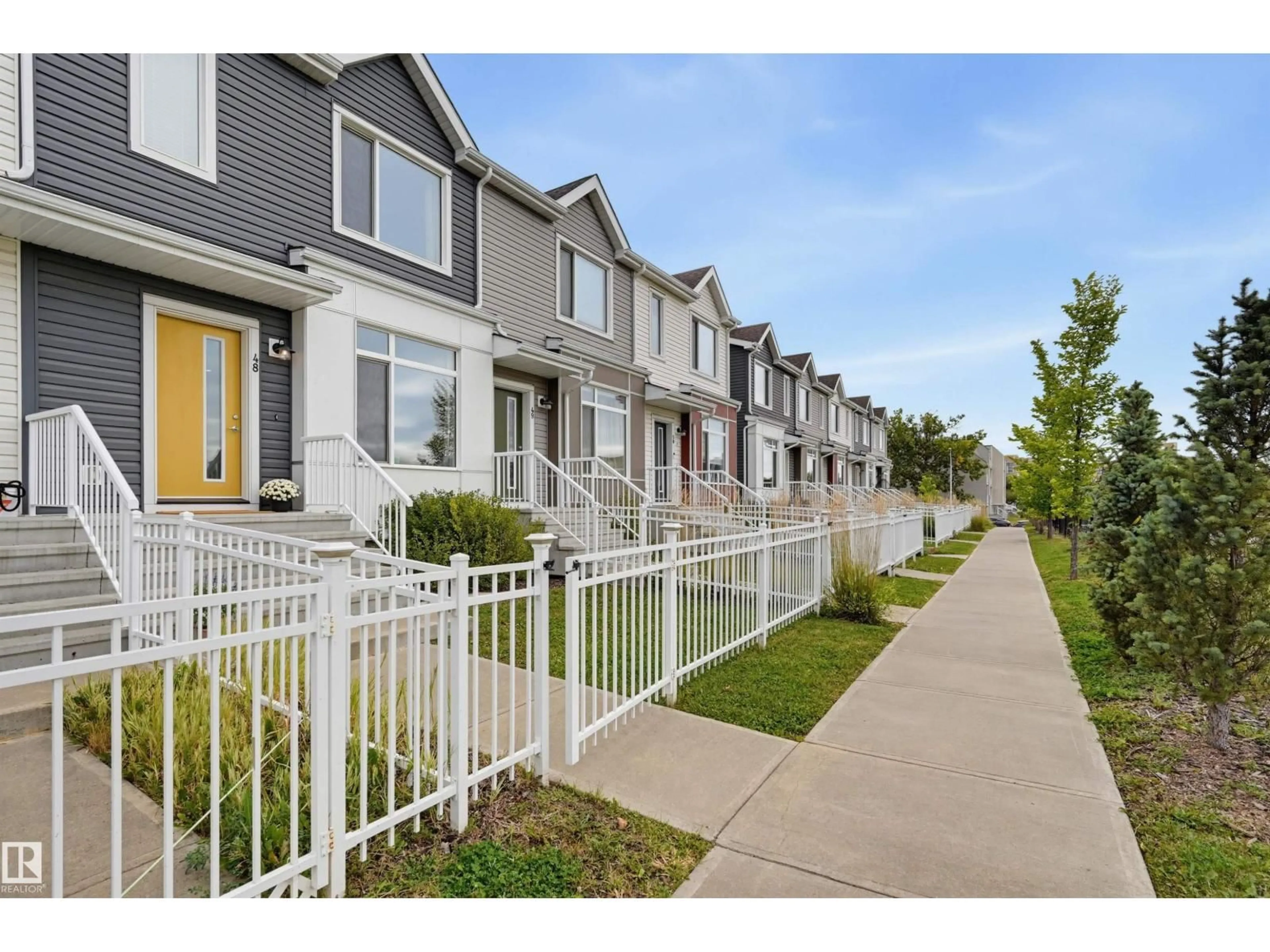 Home with vinyl exterior material, street for 48 215 SADDLEBACK RD, Edmonton Alberta T6J5T6