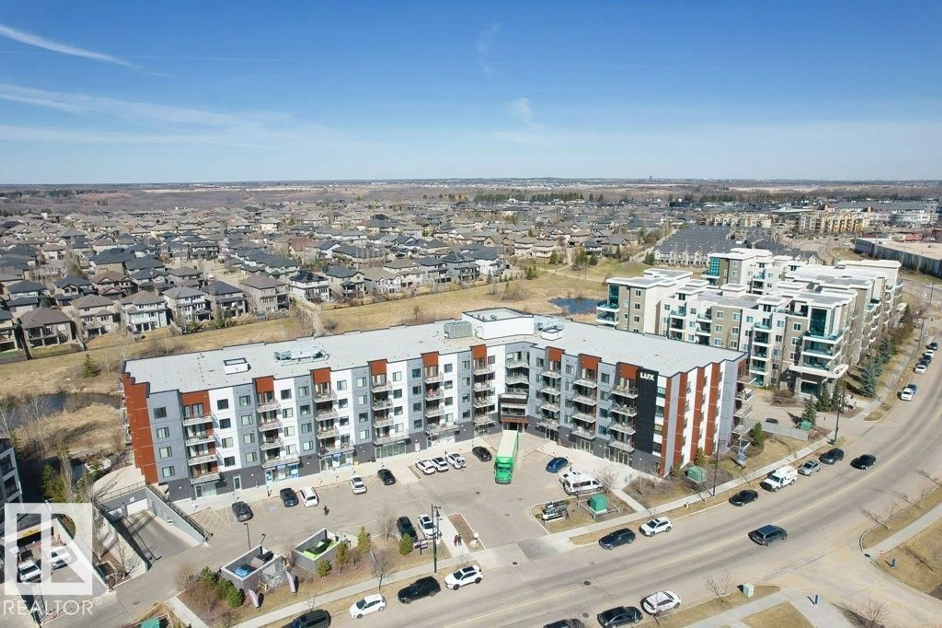 A pic from outside/outdoor area/front of a property/back of a property/a pic from drone, city buildings view from balcony for 1316 WINDERMERE WY, Edmonton Alberta T6W2J3