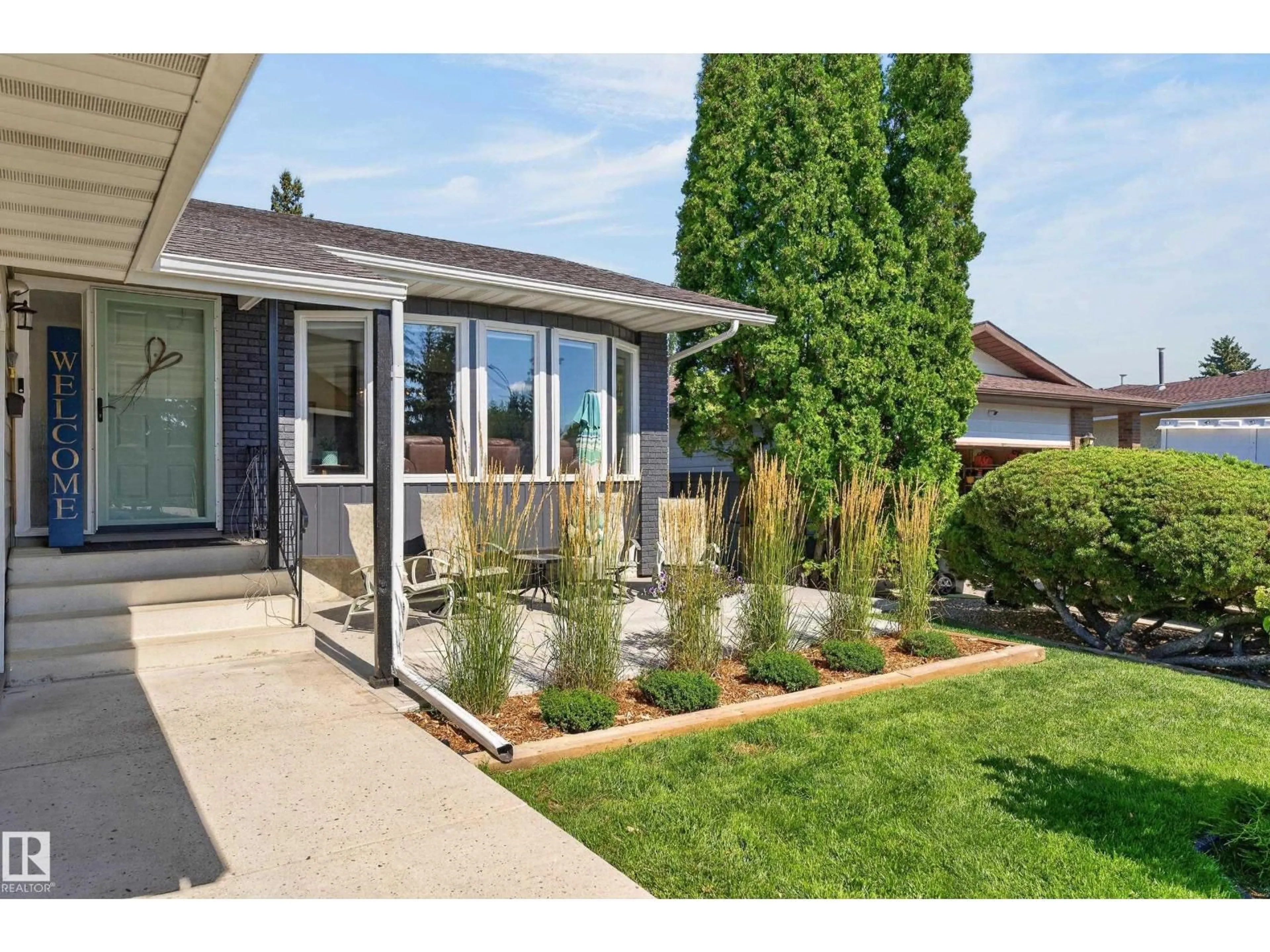 Home with vinyl exterior material, street for 18316 71 AV, Edmonton Alberta T5T2V7