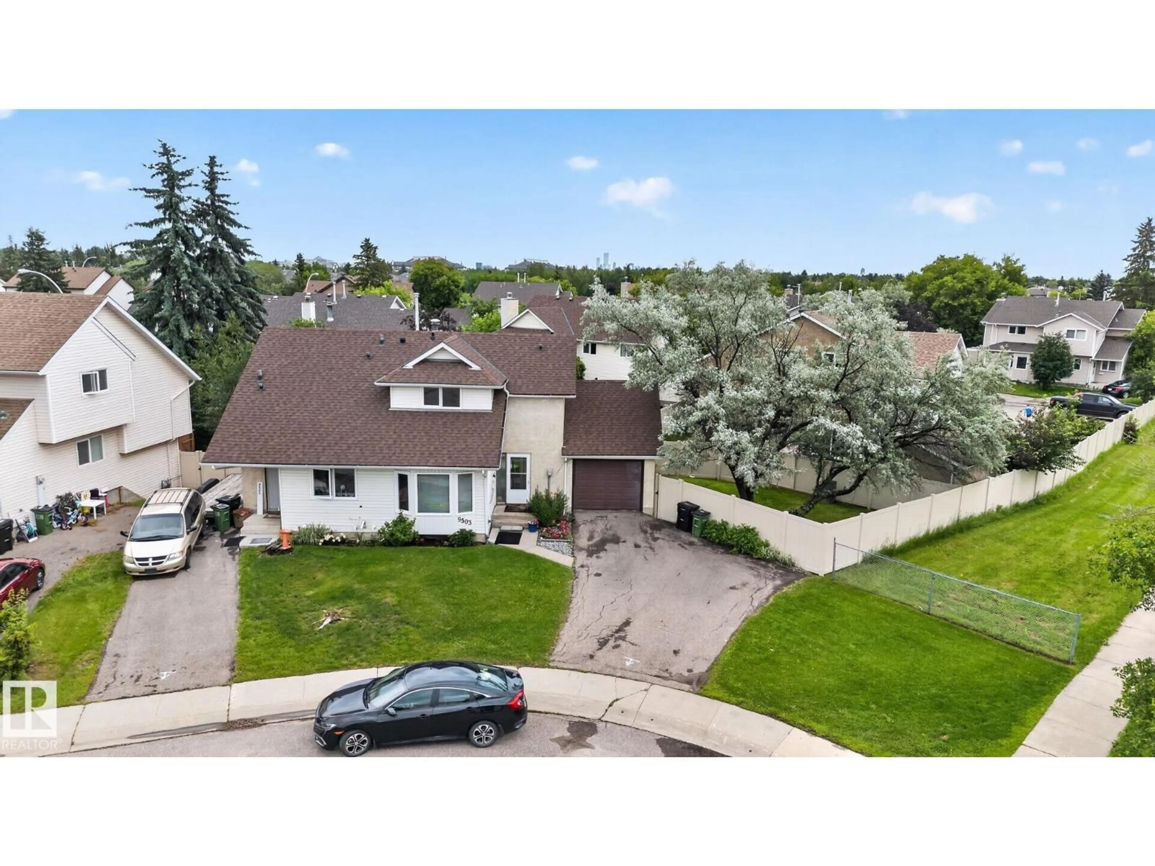 A pic from outside/outdoor area/front of a property/back of a property/a pic from drone, street for NW - 9503 180A ST, Edmonton Alberta T5T2Z4