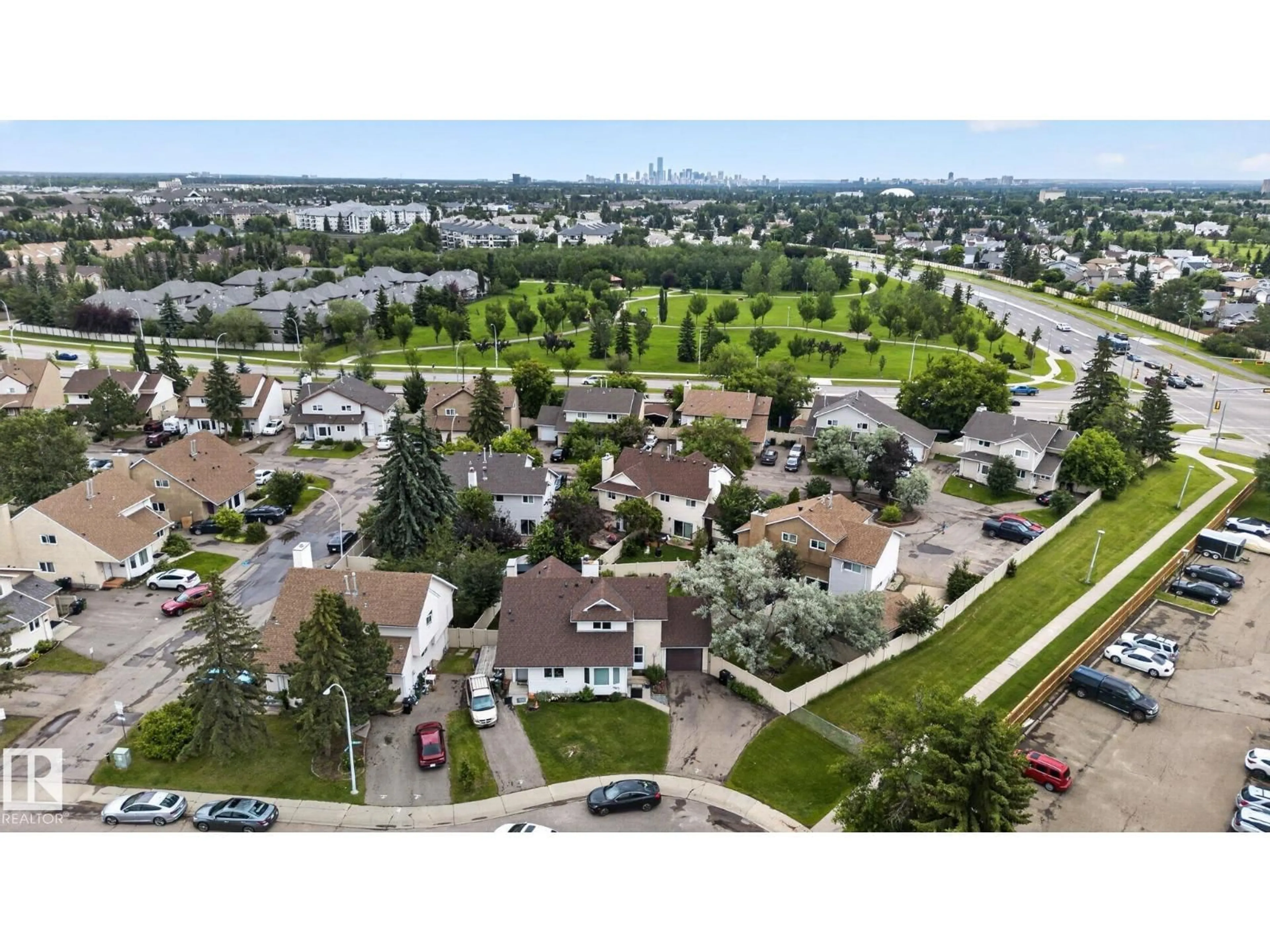 A pic from outside/outdoor area/front of a property/back of a property/a pic from drone, unknown for NW - 9503 180A ST, Edmonton Alberta T5T2Z4