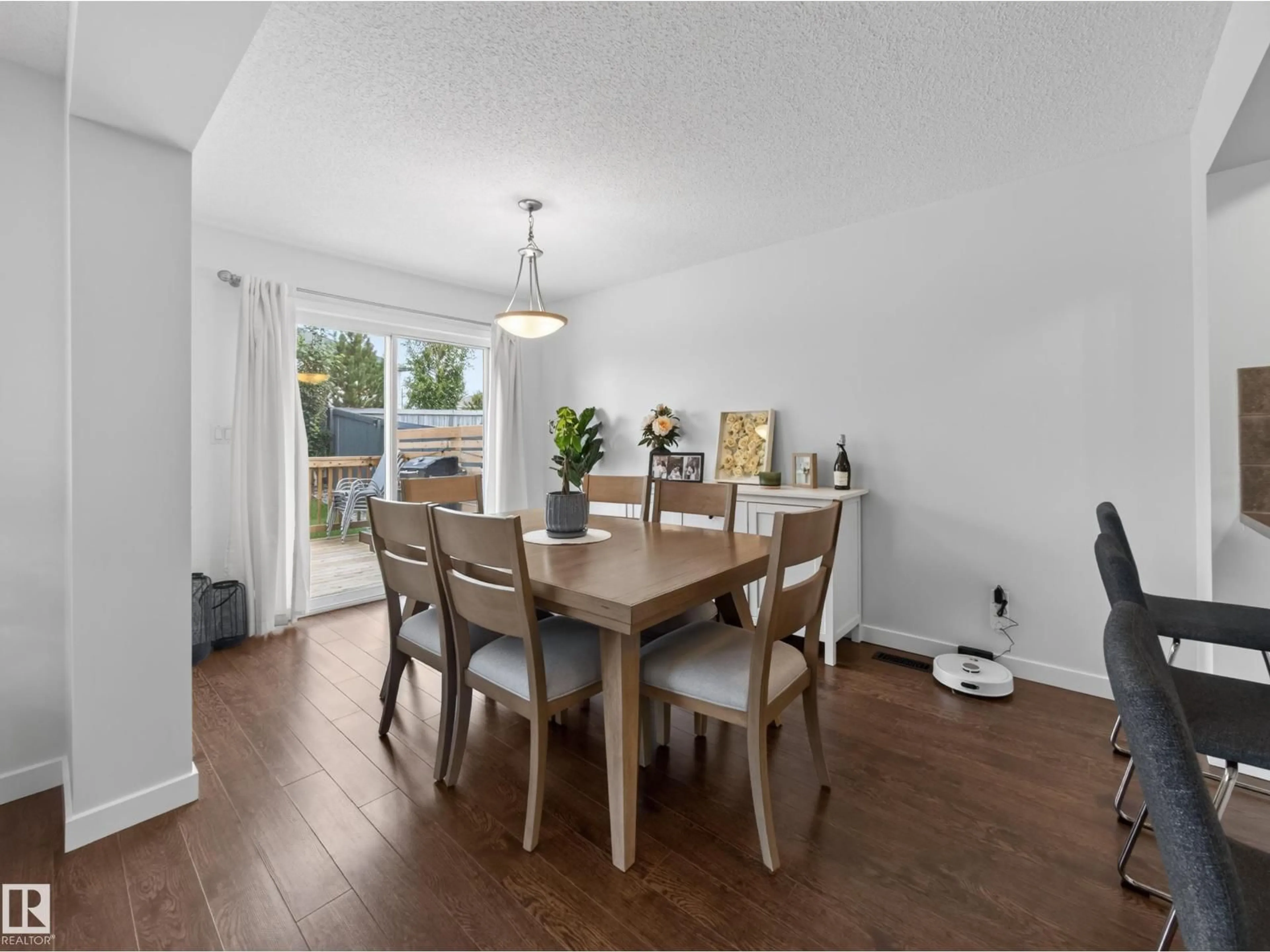 Dining room, wood/laminate floor for 64 CAMPBELL COURT, Fort Saskatchewan Alberta T8L0E5