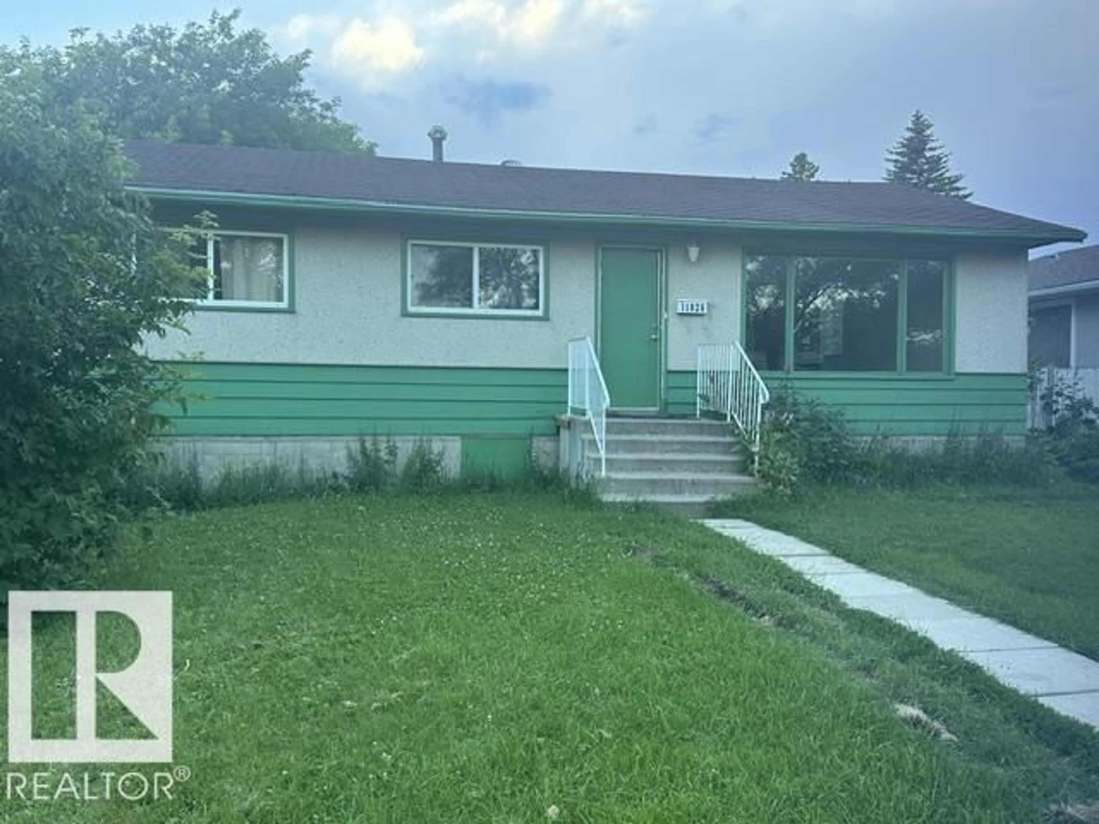 Home with vinyl exterior material, street for NW - 11026 155 ST, Edmonton Alberta T5P2N3