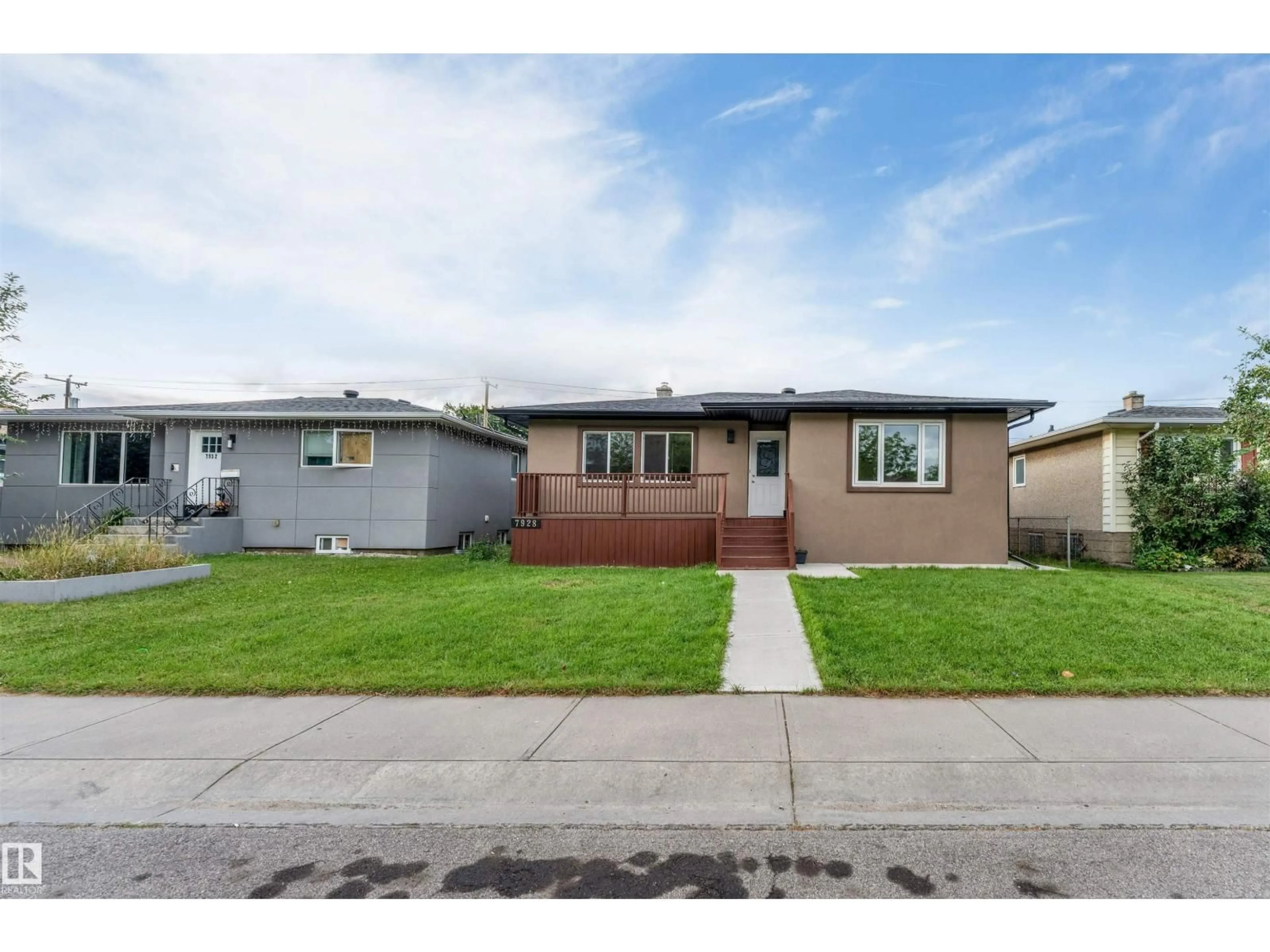 Home with vinyl exterior material, street for 7928 82 AV, Edmonton Alberta T6C0Y2