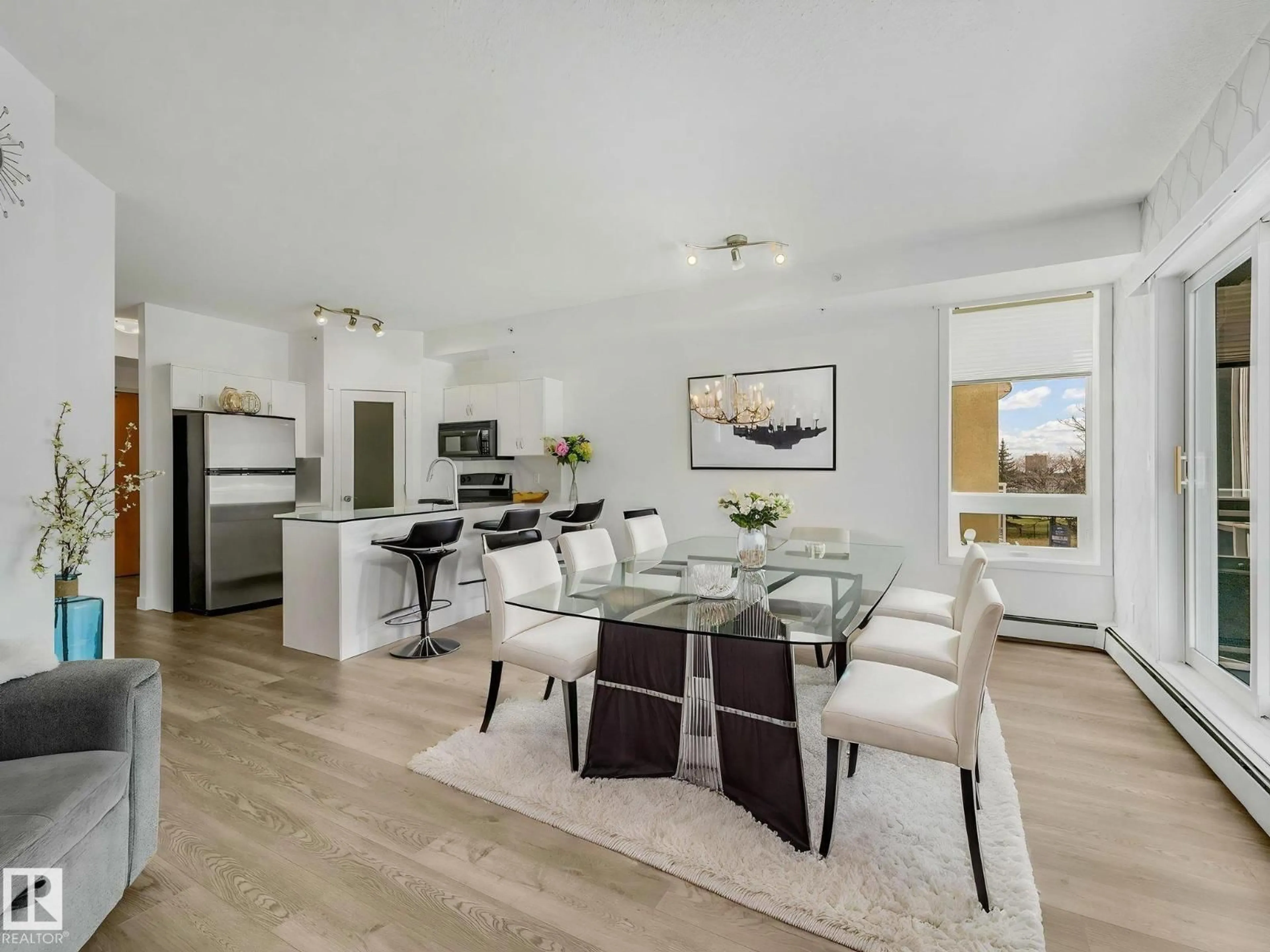 Open concept kitchen, wood/laminate floor for #305 - 10504 99 AV, Edmonton Alberta T5K1B2