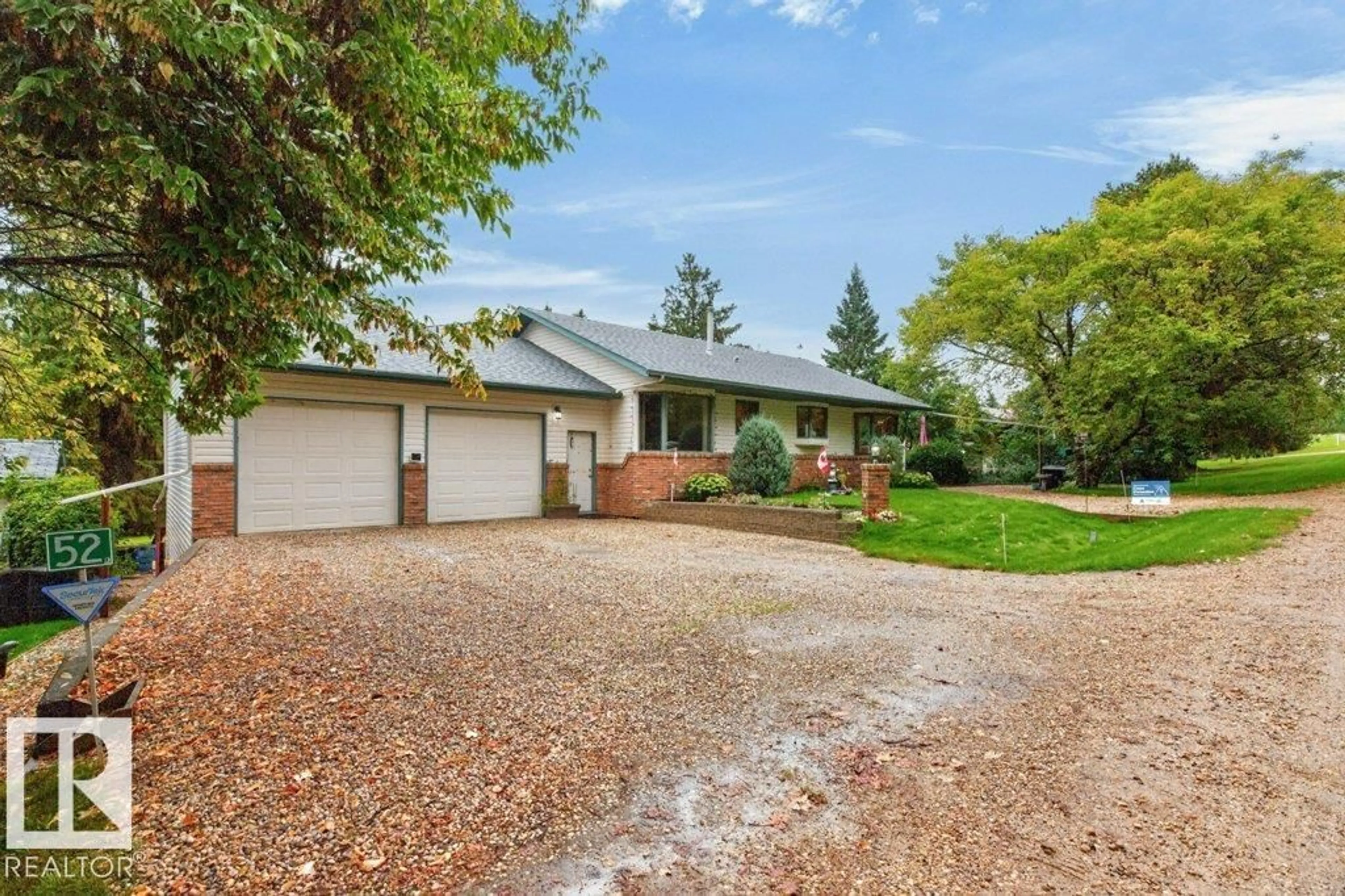 A pic from outside/outdoor area/front of a property/back of a property/a pic from drone, street for 52 52515 RGE ROAD 52, Rural Parkland County Alberta T0E2B0