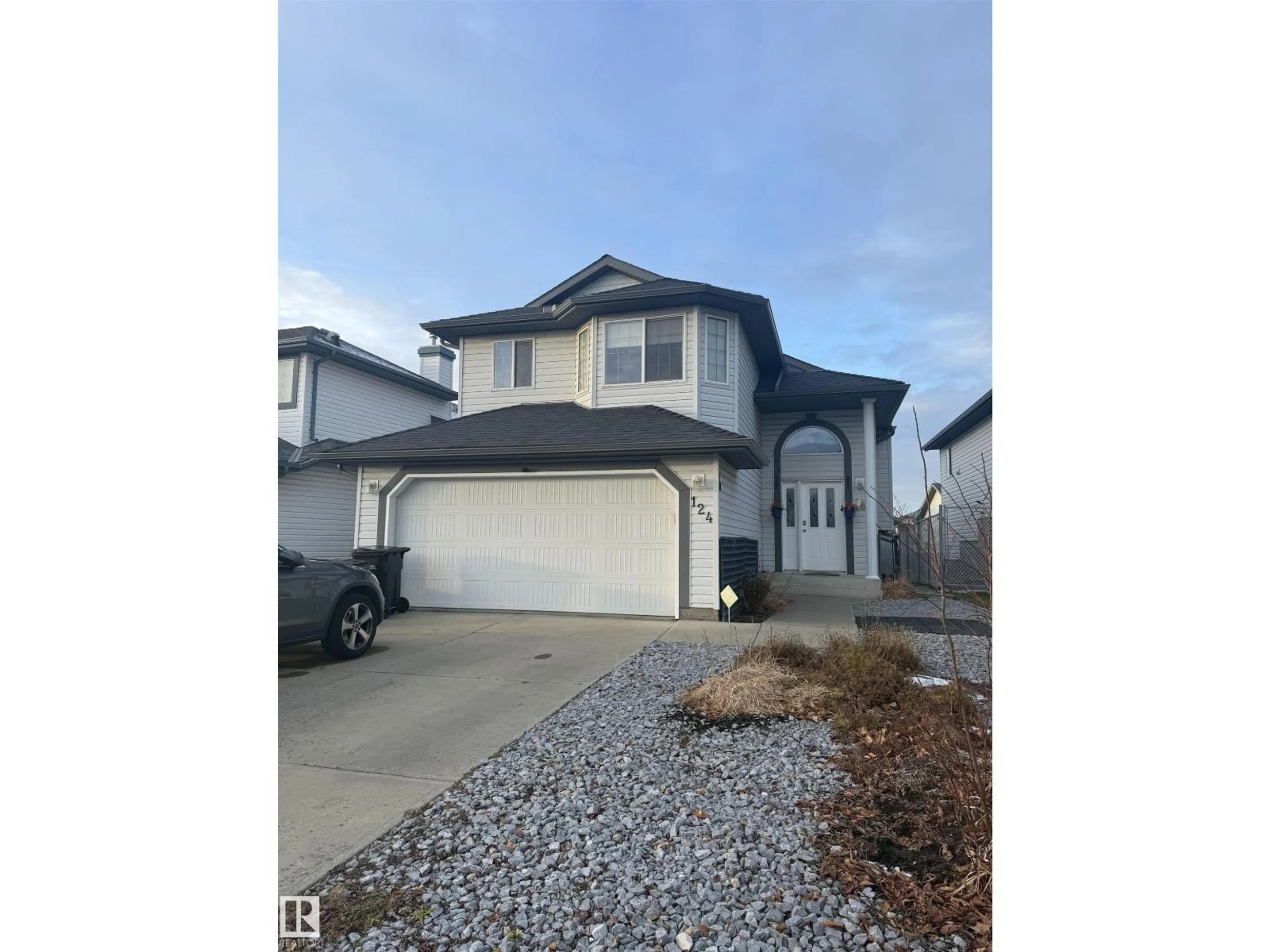 Home with vinyl exterior material, street for 124 WARD CRESCENT, Edmonton Alberta T6T1M6