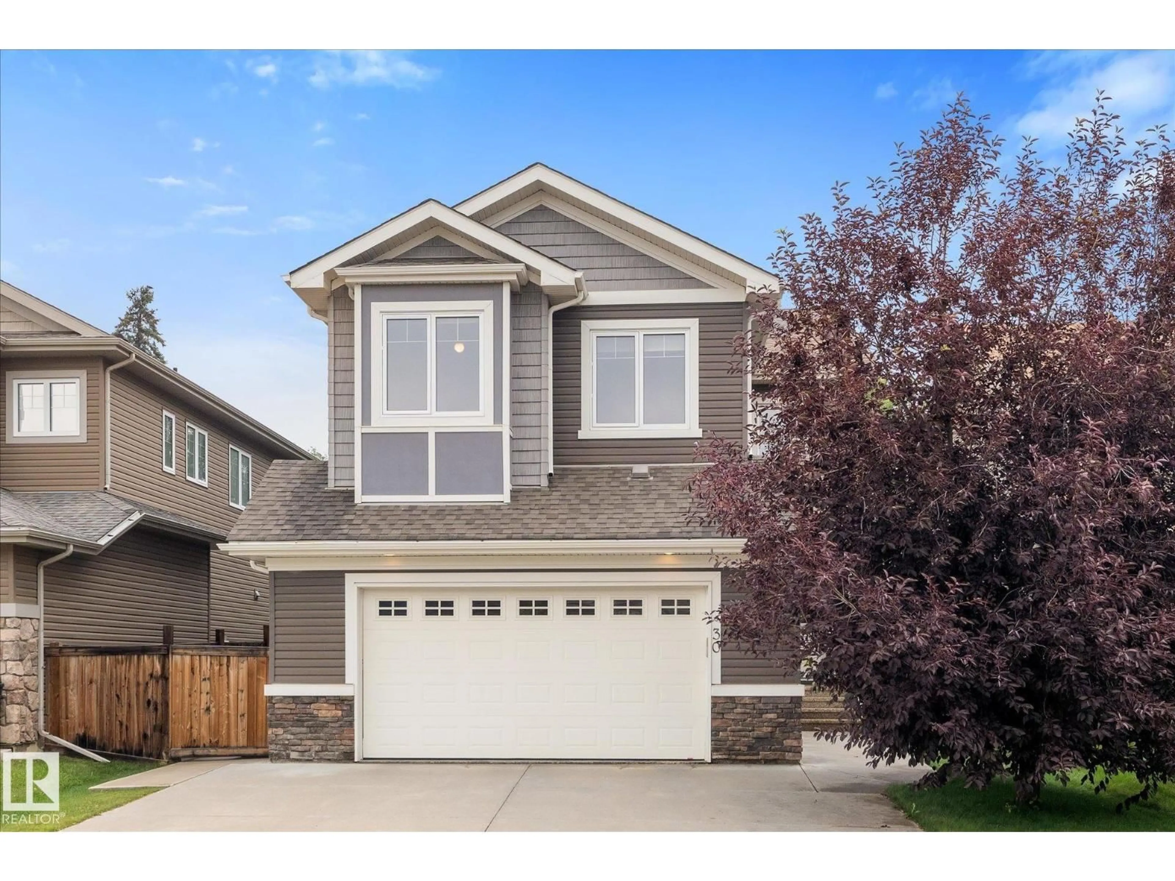 Home with vinyl exterior material, street for 30 HICKORY TR, Spruce Grove Alberta T7X0N6