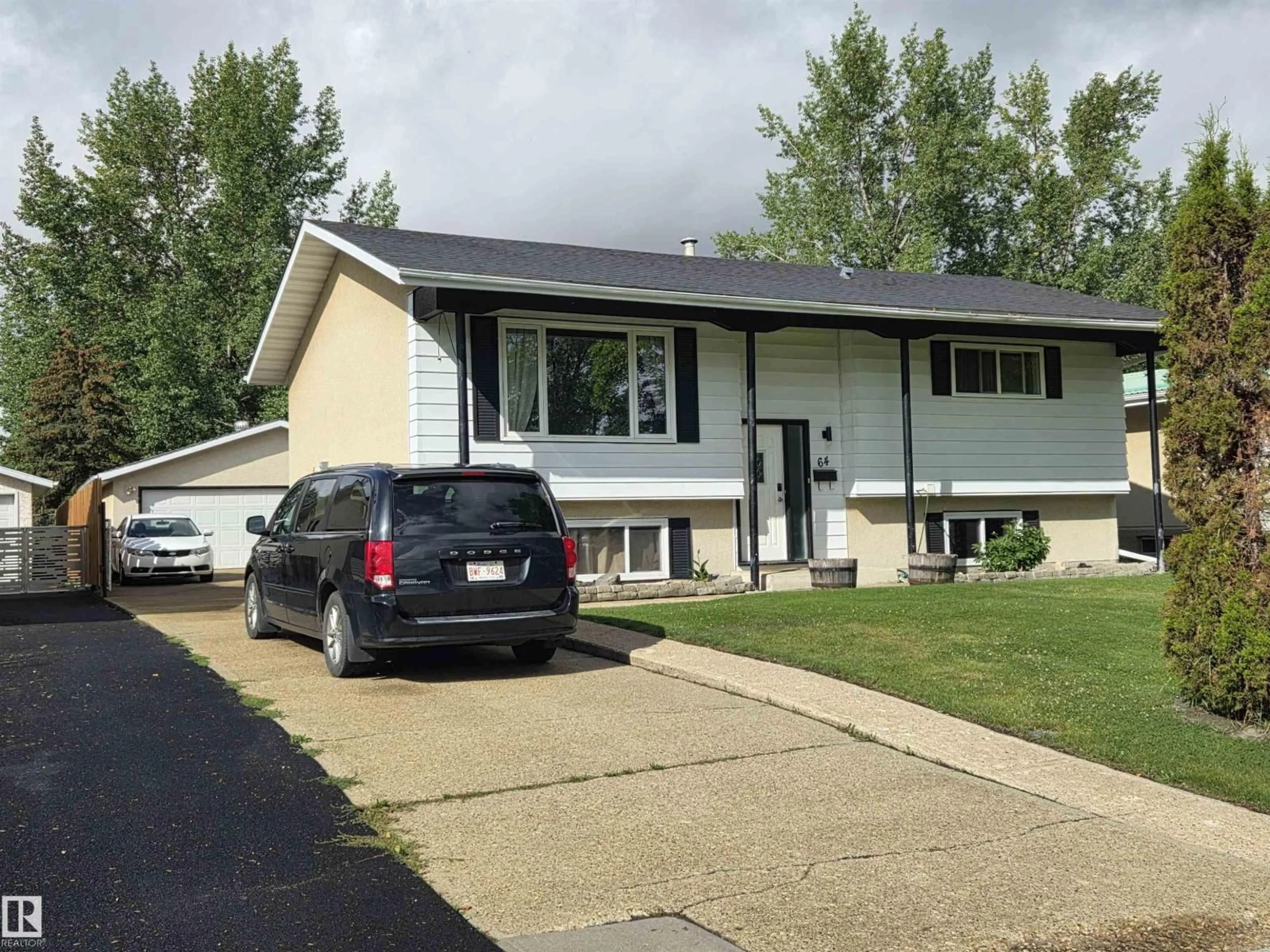 Home with vinyl exterior material, street for 64 APACHE CR, Leduc Alberta T9E4H4