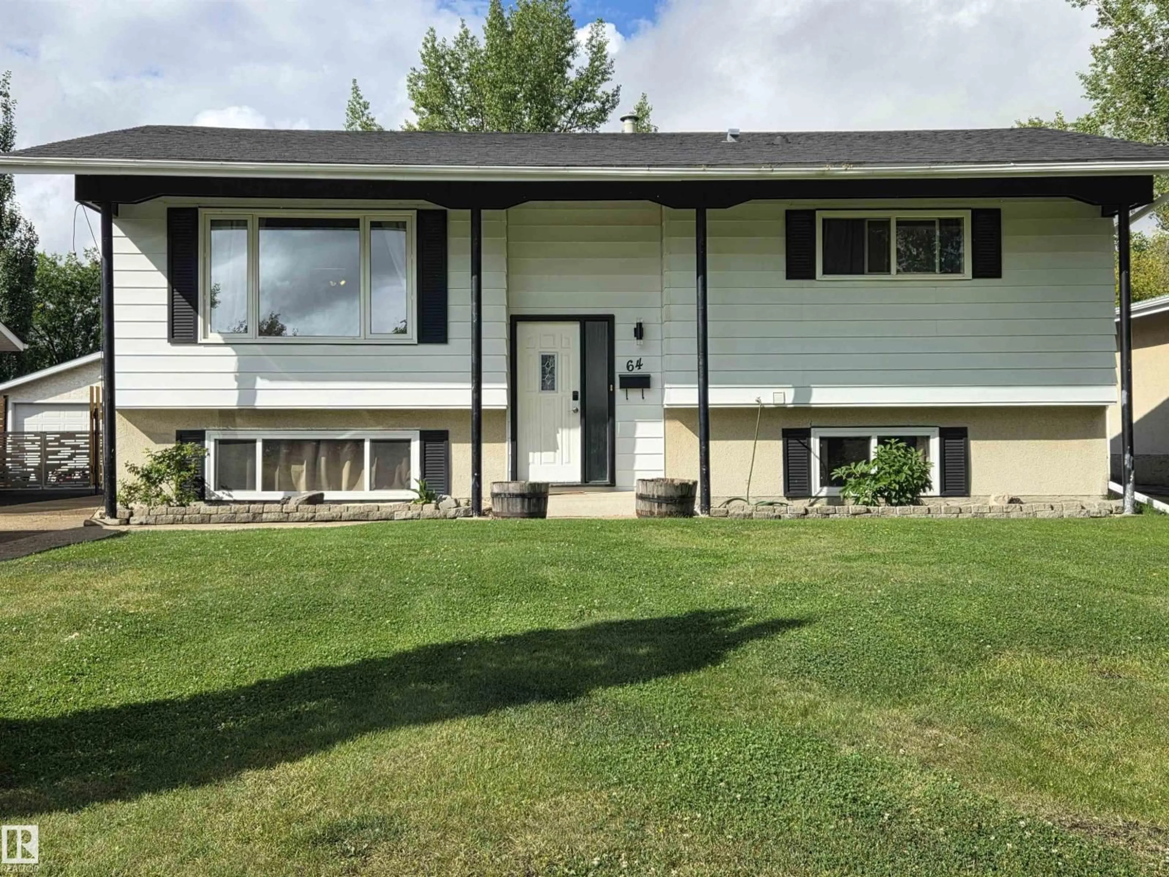 Home with vinyl exterior material, street for 64 APACHE CR, Leduc Alberta T9E4H4