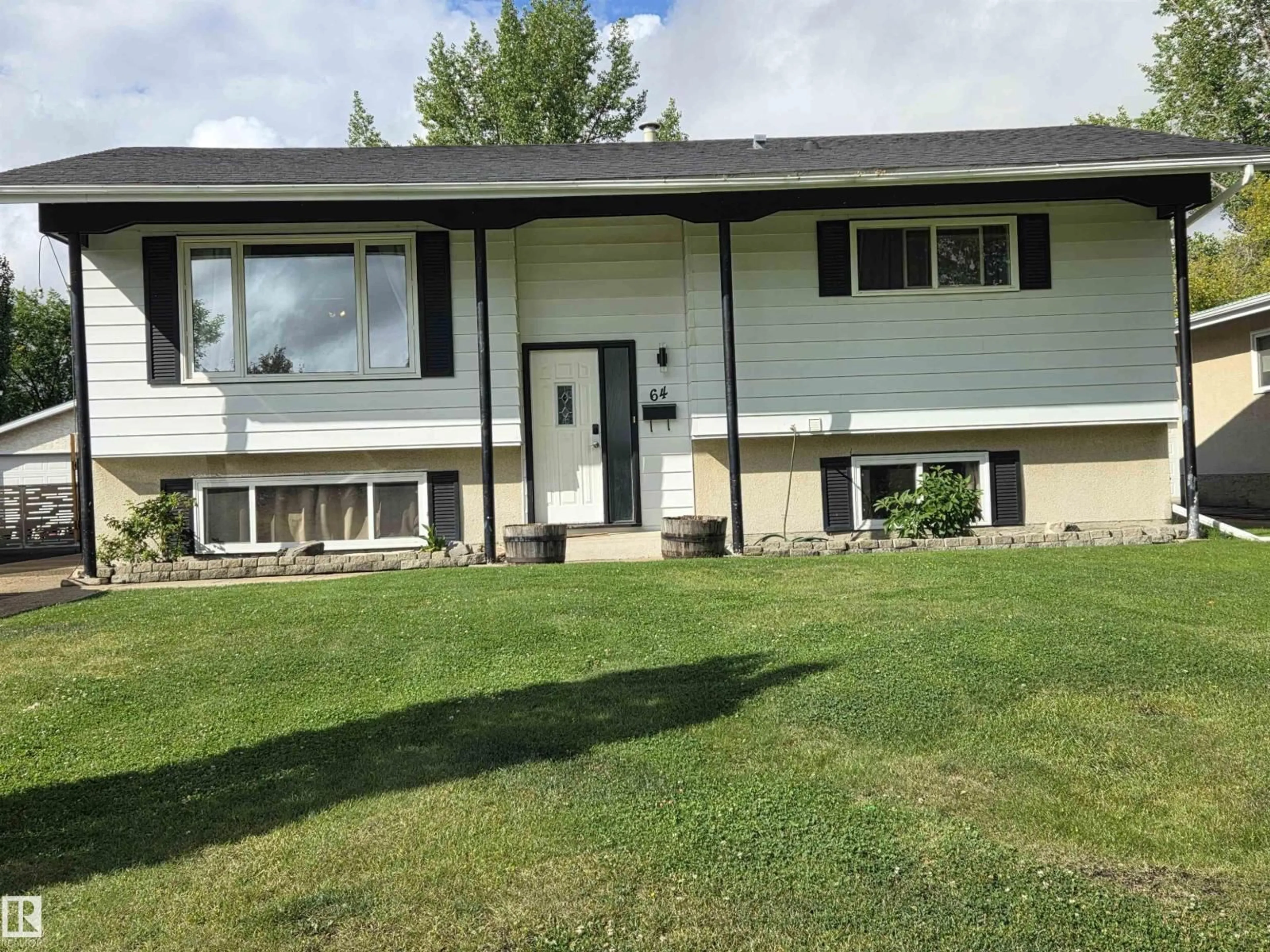 Home with vinyl exterior material, street for 64 APACHE CR, Leduc Alberta T9E4H4