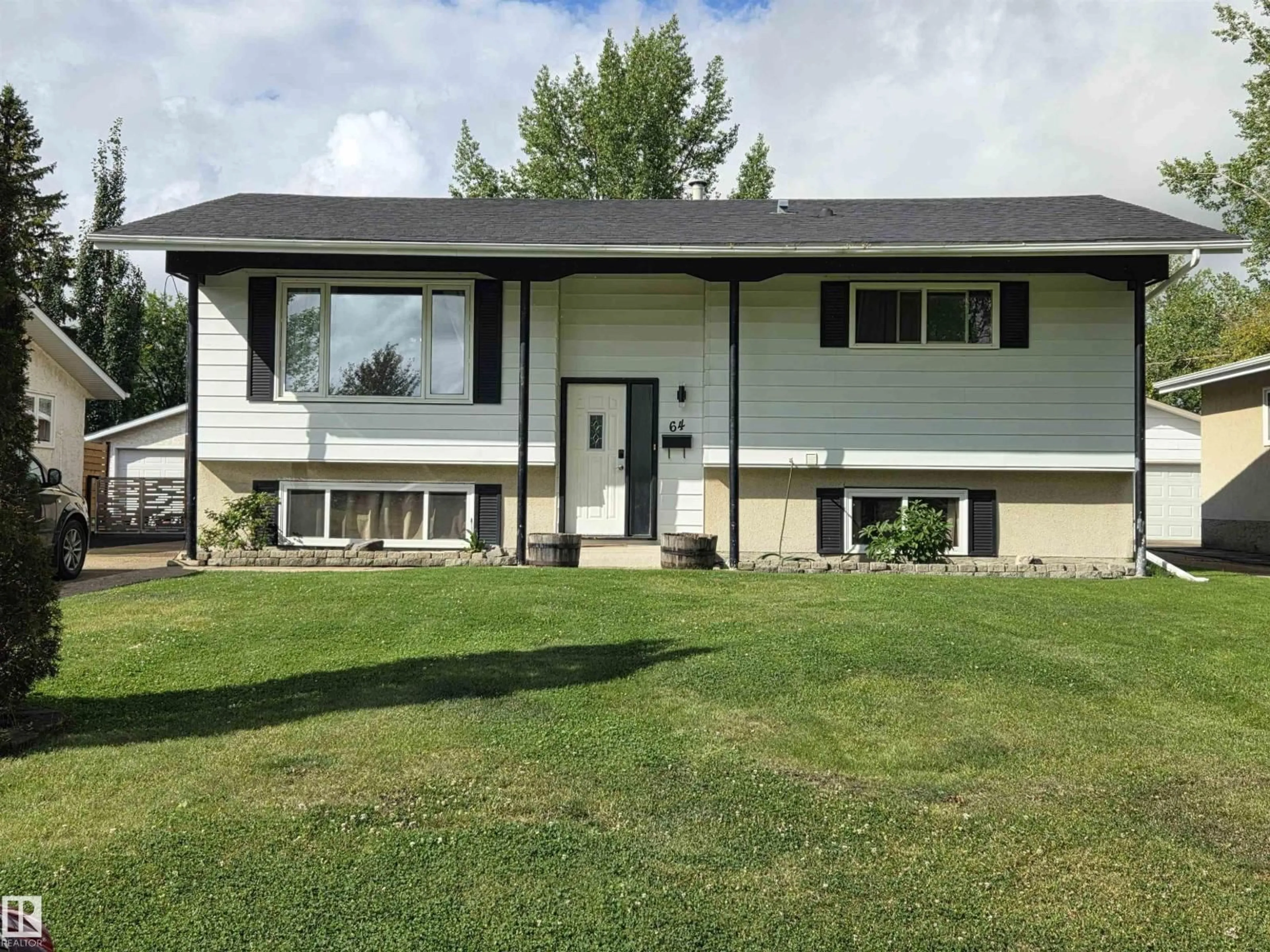 Home with vinyl exterior material, street for 64 APACHE CR, Leduc Alberta T9E4H4