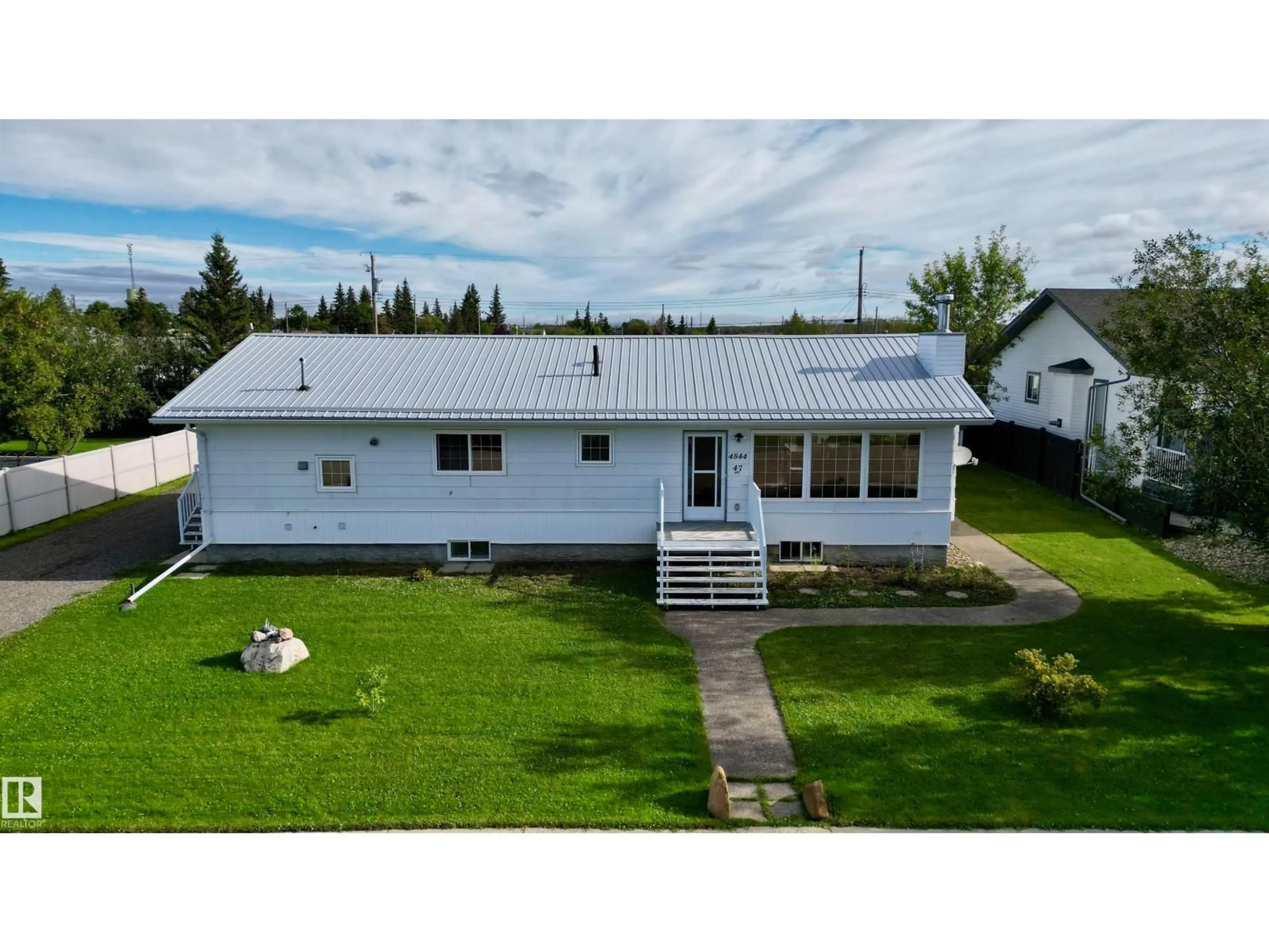 A pic from outside/outdoor area/front of a property/back of a property/a pic from drone, building for 4844 47 AV, Chipman Alberta T0B0W0