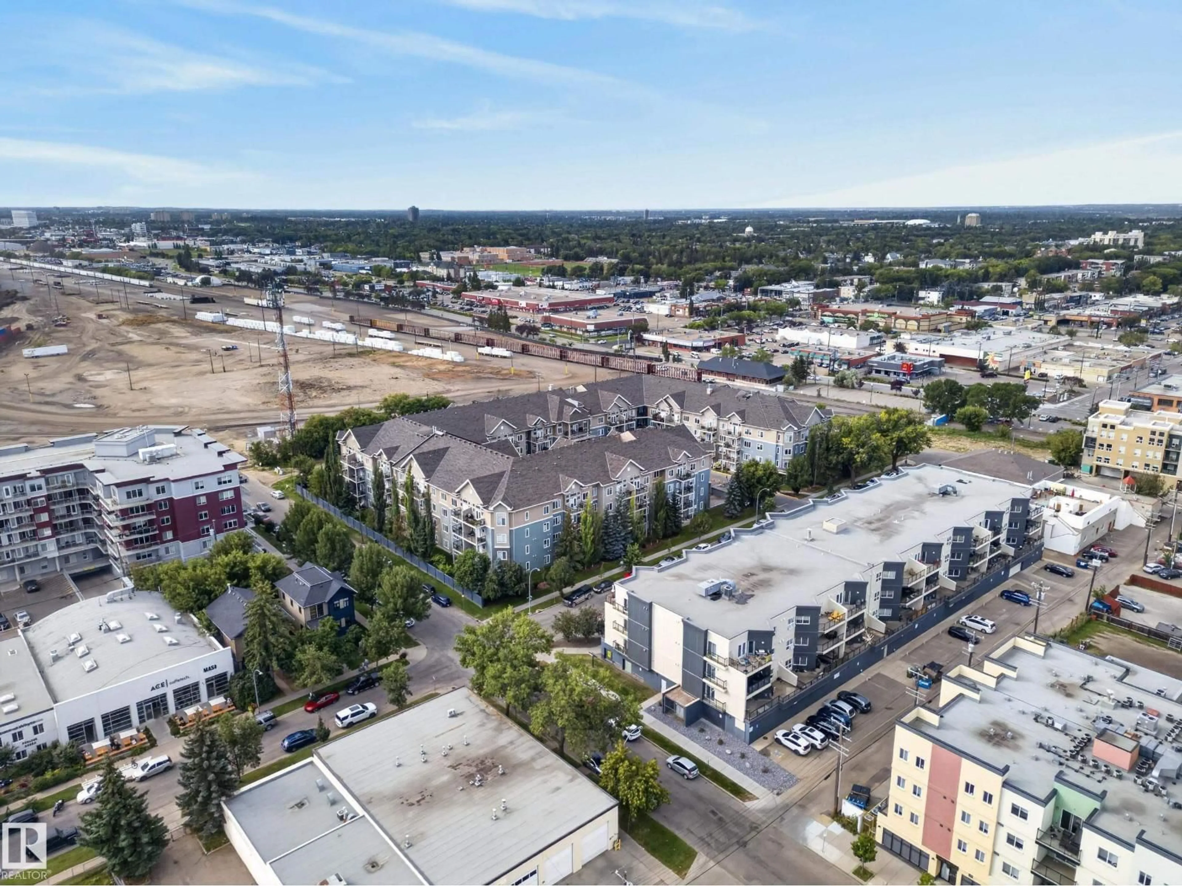 A pic from outside/outdoor area/front of a property/back of a property/a pic from drone, unknown for 210 - 10121 80 AV, Edmonton Alberta T6E0B9