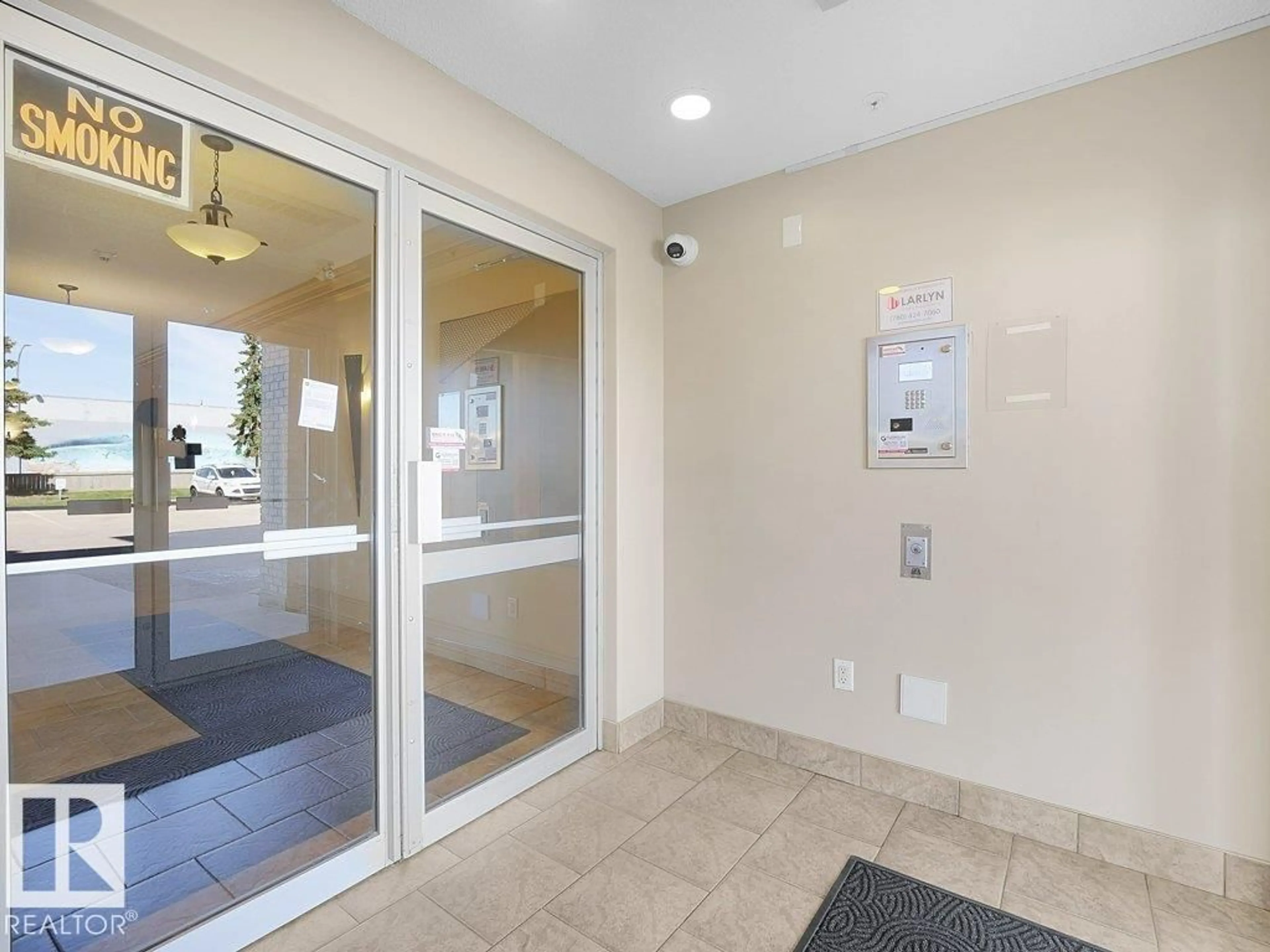 Indoor foyer for #116 - 16807 100 AV, Edmonton Alberta T5P4Z6