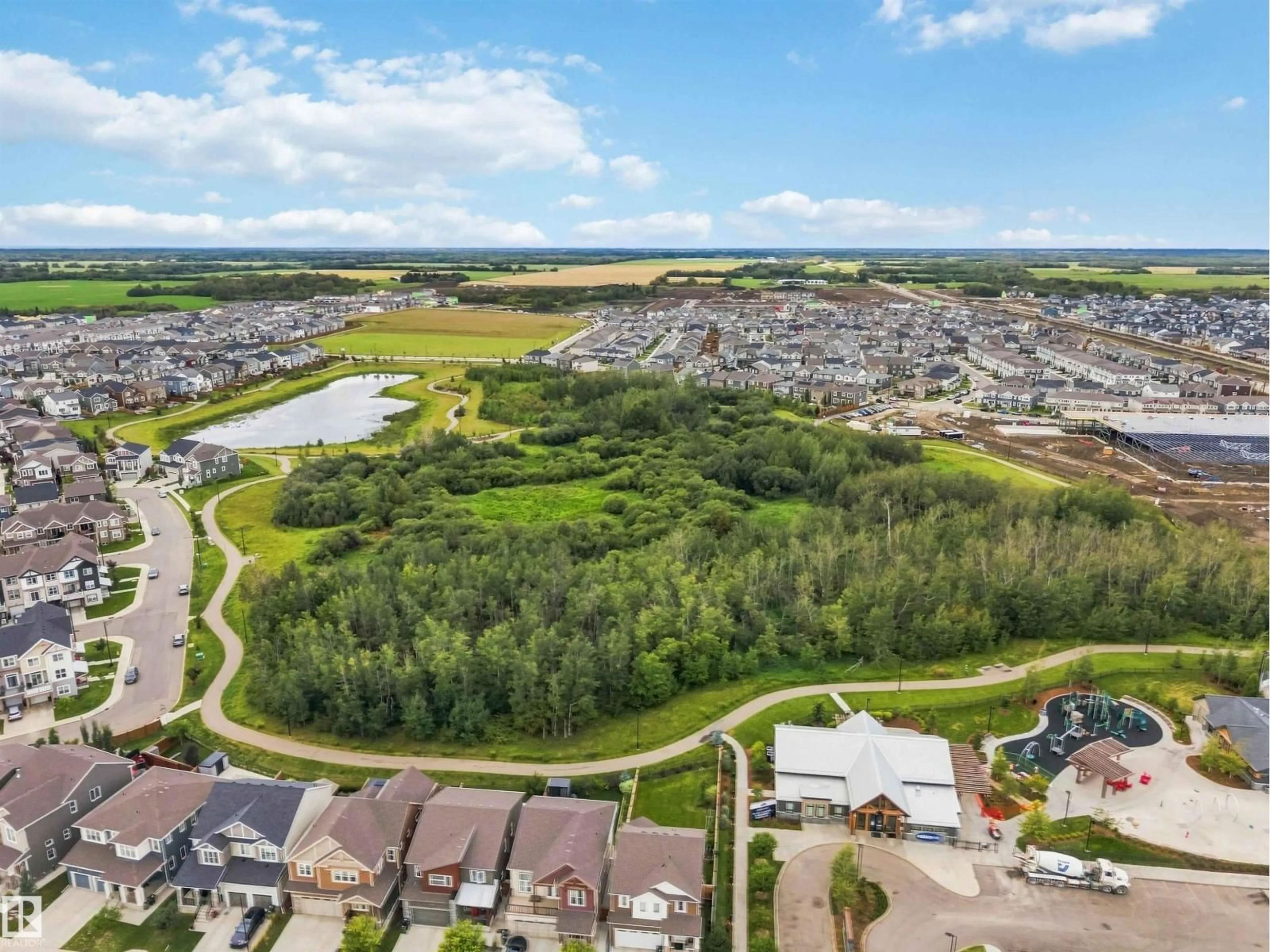 A pic from outside/outdoor area/front of a property/back of a property/a pic from drone, water/lake/river/ocean view for NW - 20127 19 AV, Edmonton Alberta T6M0X9
