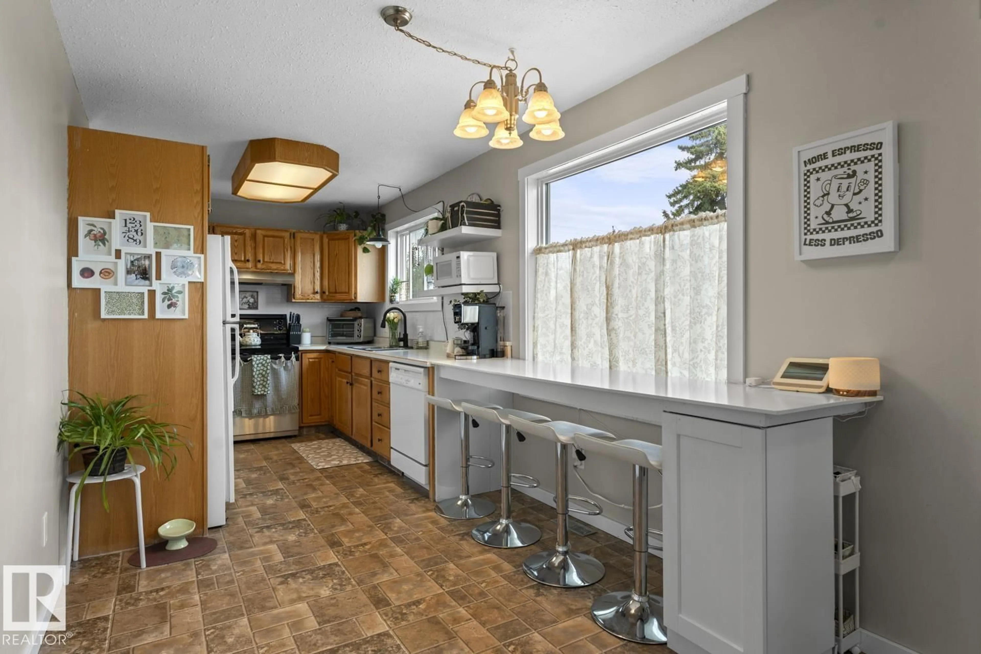 Open concept kitchen, ceramic/tile floor for 1401 9 ST, Cold Lake Alberta T9M1J7