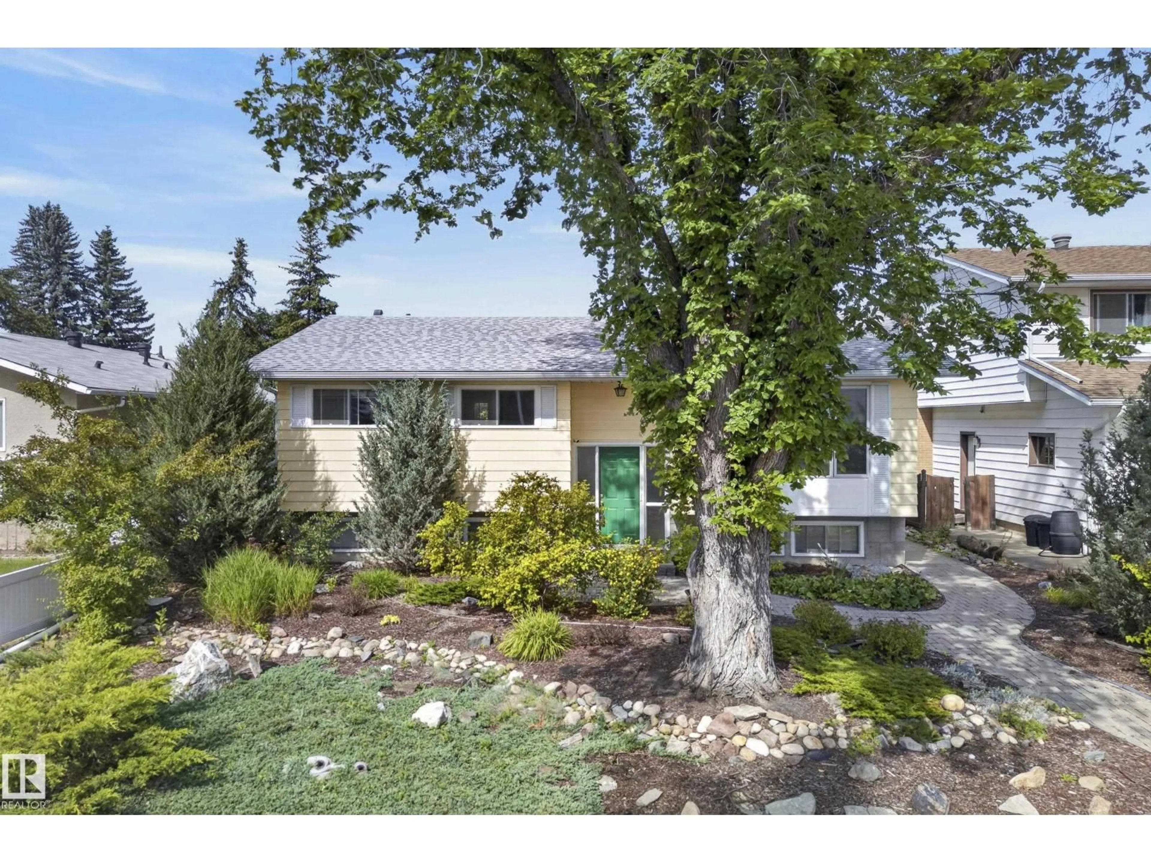 Home with vinyl exterior material, street for NW - 10968 35A AV, Edmonton Alberta T6J0A3