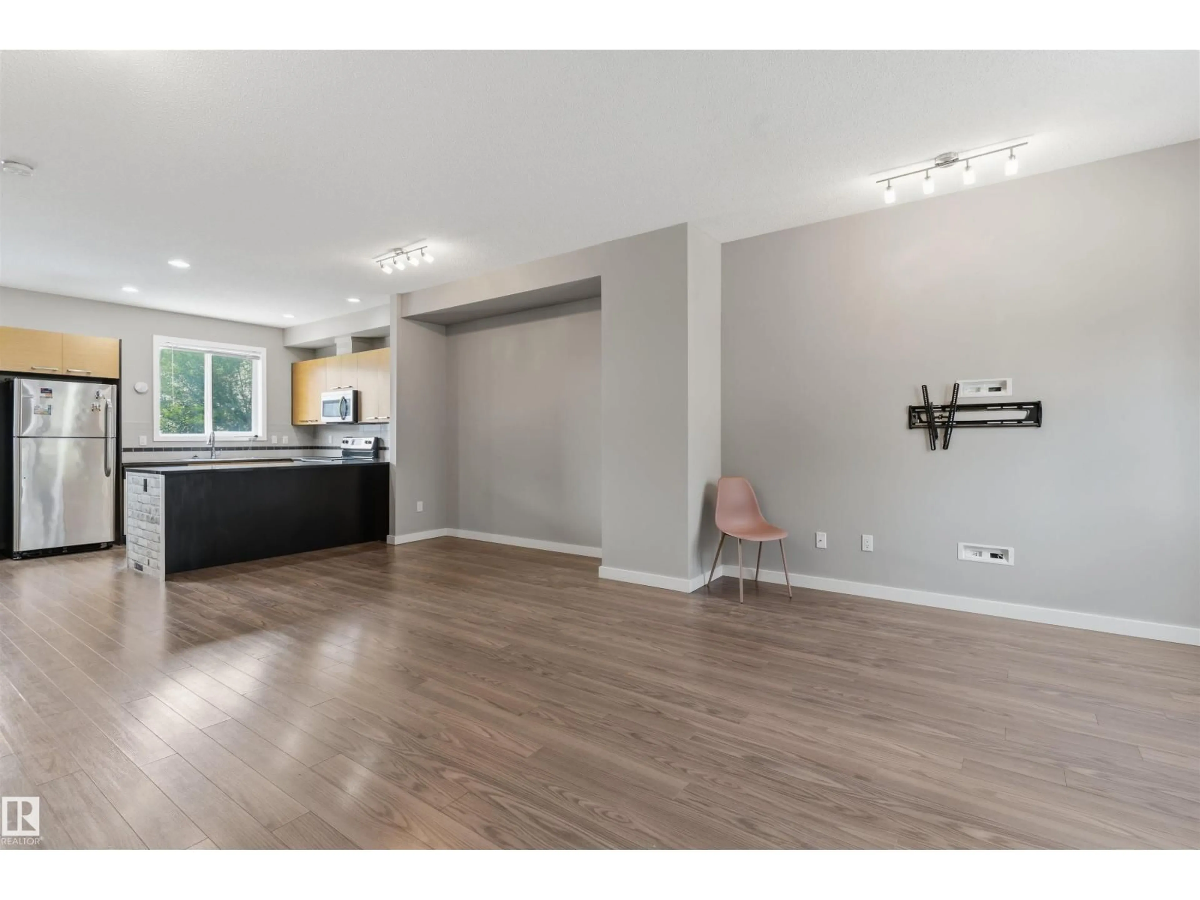 Open concept kitchen, wood/laminate floor for 675 - 62 WATT BV, Edmonton Alberta T6X0Y2