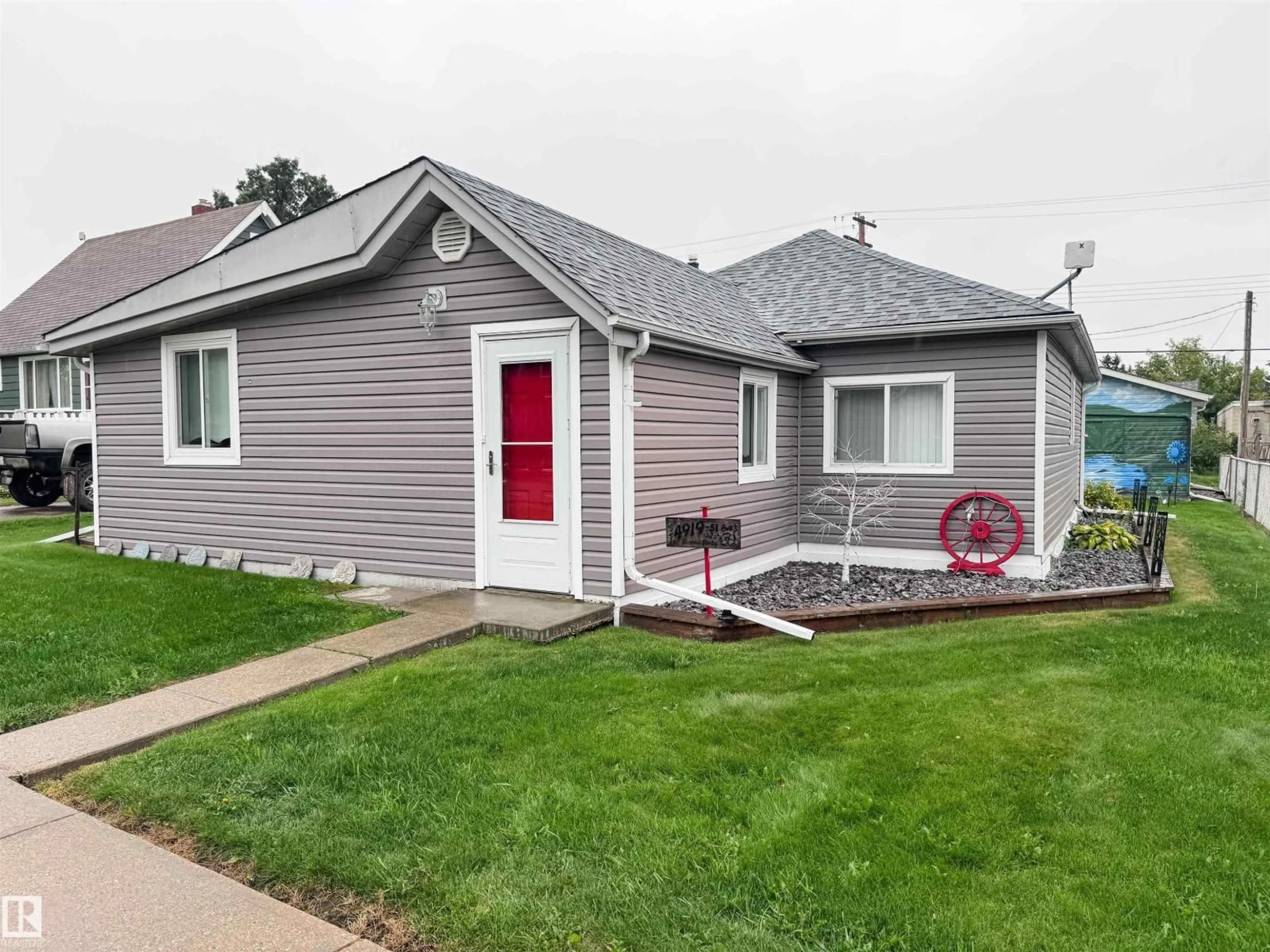 Home with vinyl exterior material, street for 4919 51 AV, Breton Alberta T0C0P0