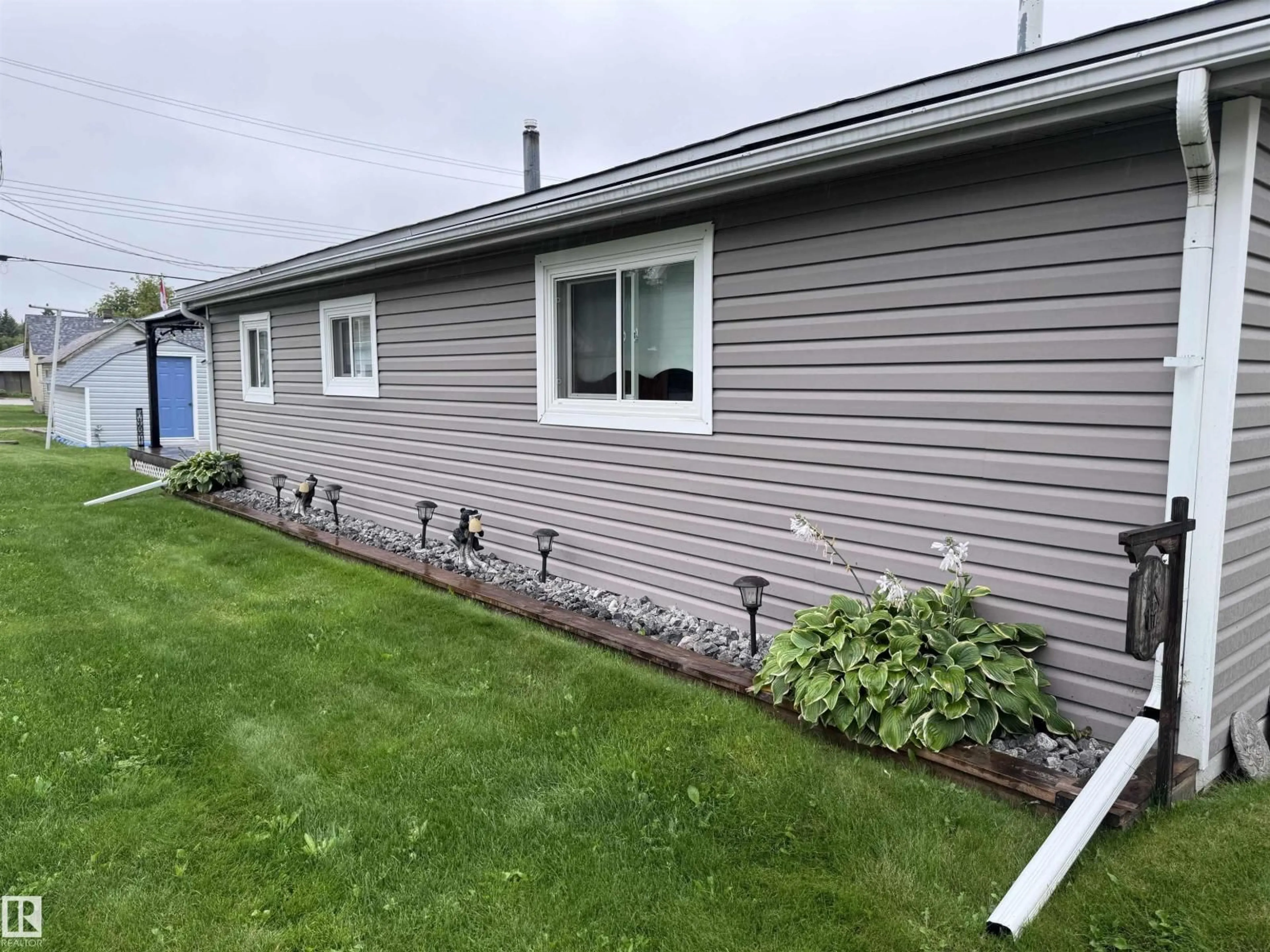 Home with vinyl exterior material, street for 4919 51 AV, Breton Alberta T0C0P0