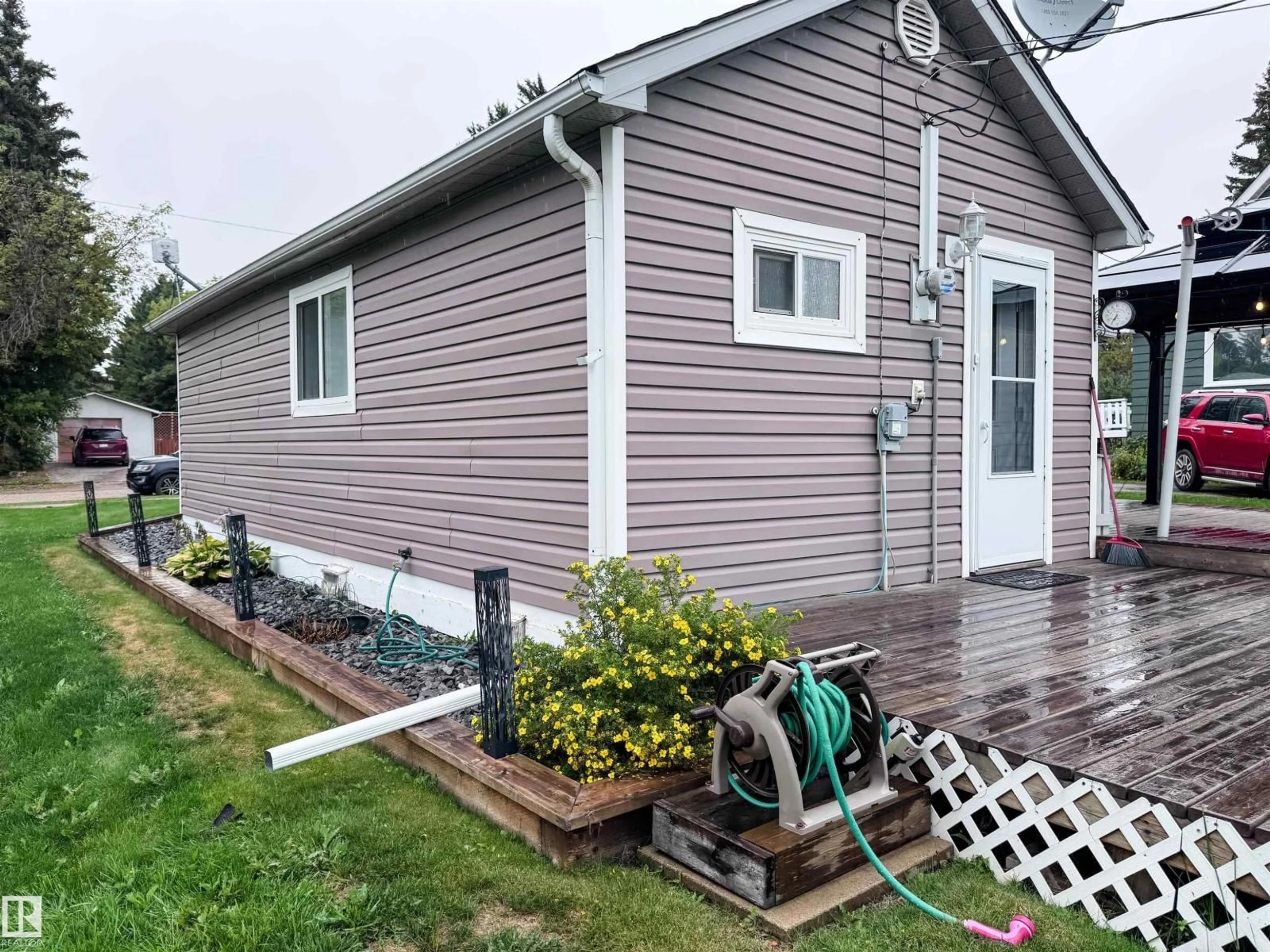 Home with vinyl exterior material, street for 4919 51 AV, Breton Alberta T0C0P0