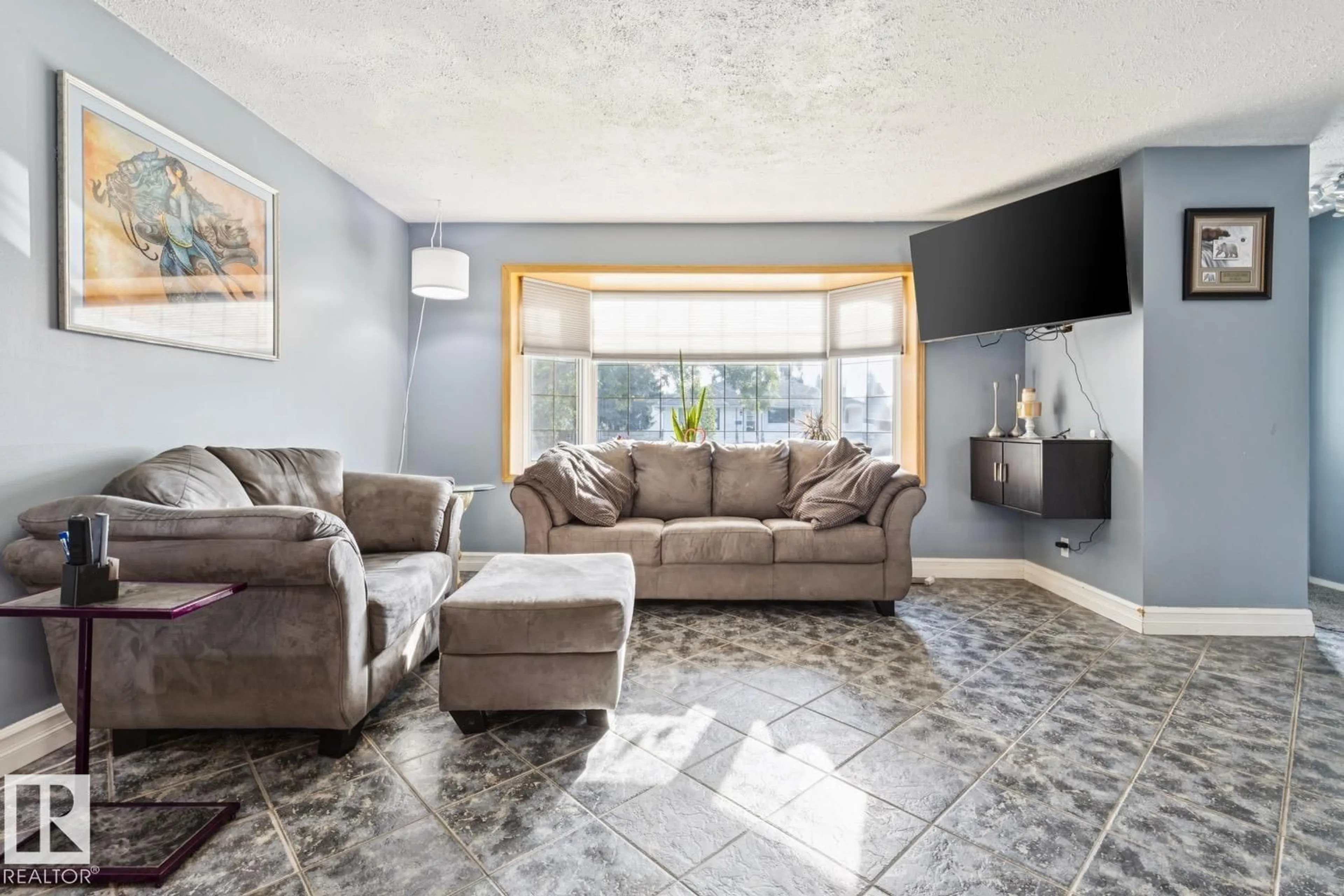 Living room with furniture, ceramic/tile floor for NW - 10830 159 ST, Edmonton Alberta T5P3B7
