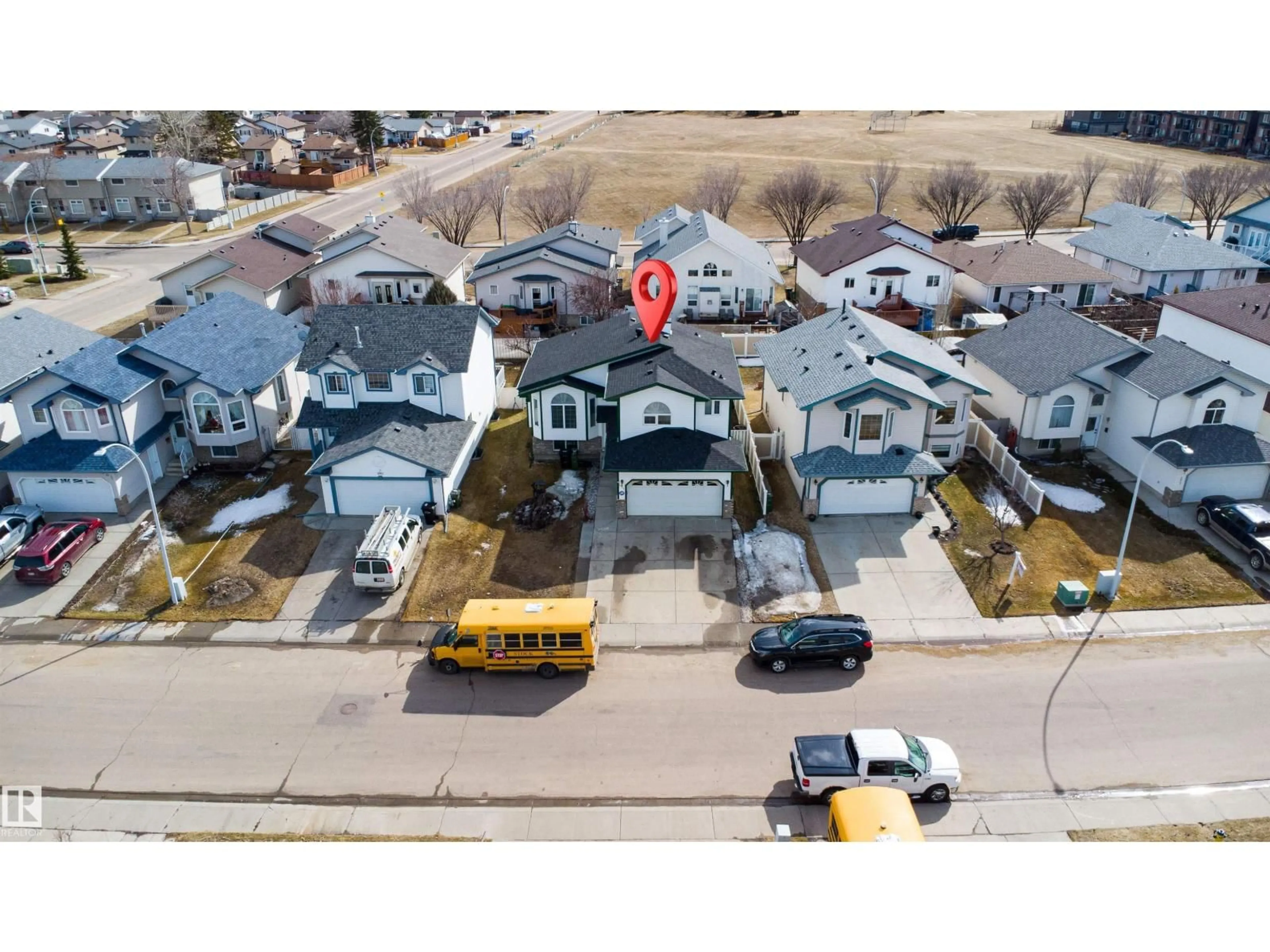 A pic from outside/outdoor area/front of a property/back of a property/a pic from drone, street for 2915 151A AV, Edmonton Alberta T5Y2Y5