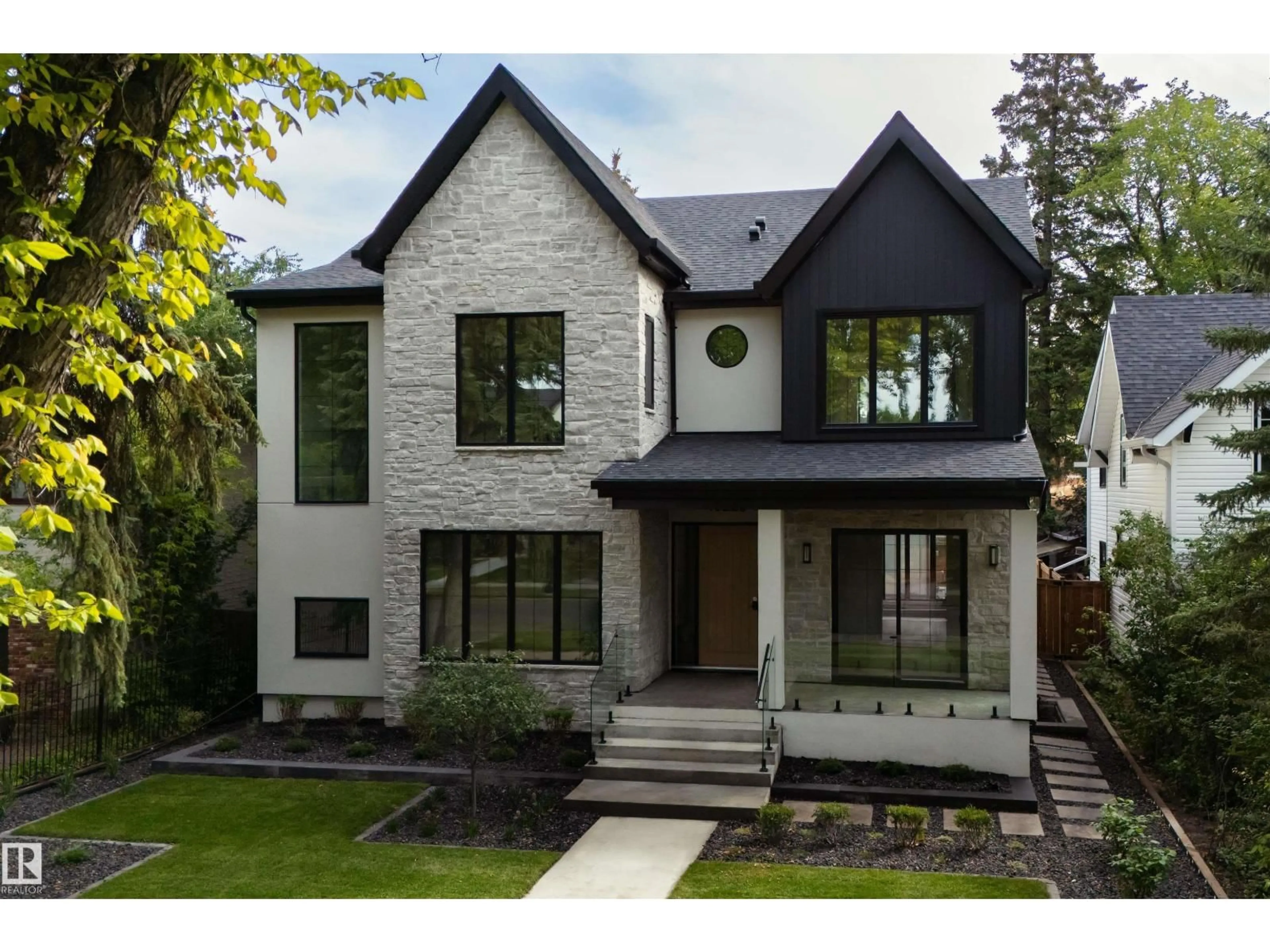 Home with brick exterior material, street for 10223 130 ST, Edmonton Alberta T5N1X4