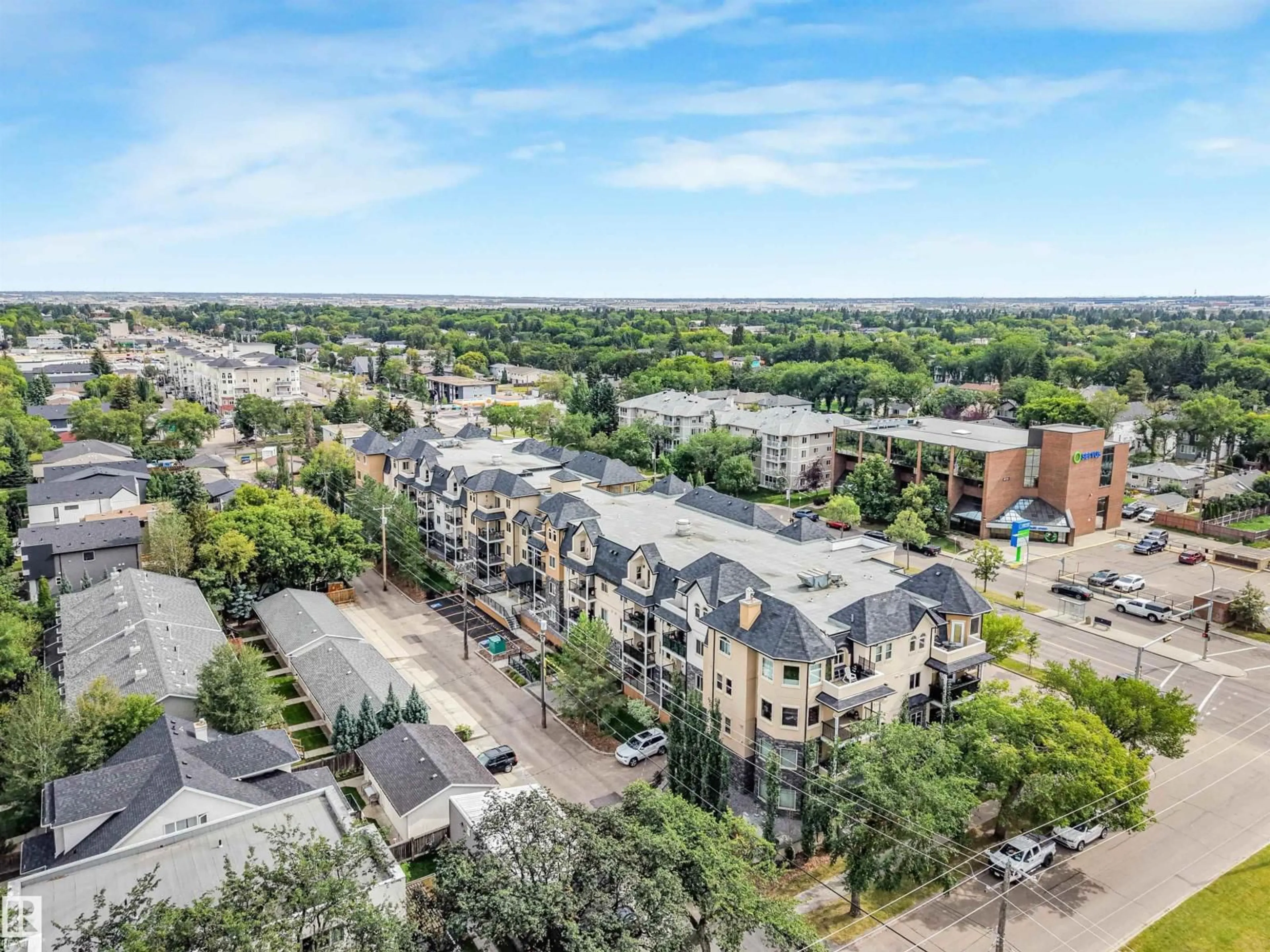 A pic from outside/outdoor area/front of a property/back of a property/a pic from drone, city buildings view from balcony for #214 - 8730 82 AV, Edmonton Alberta T6C0Z1