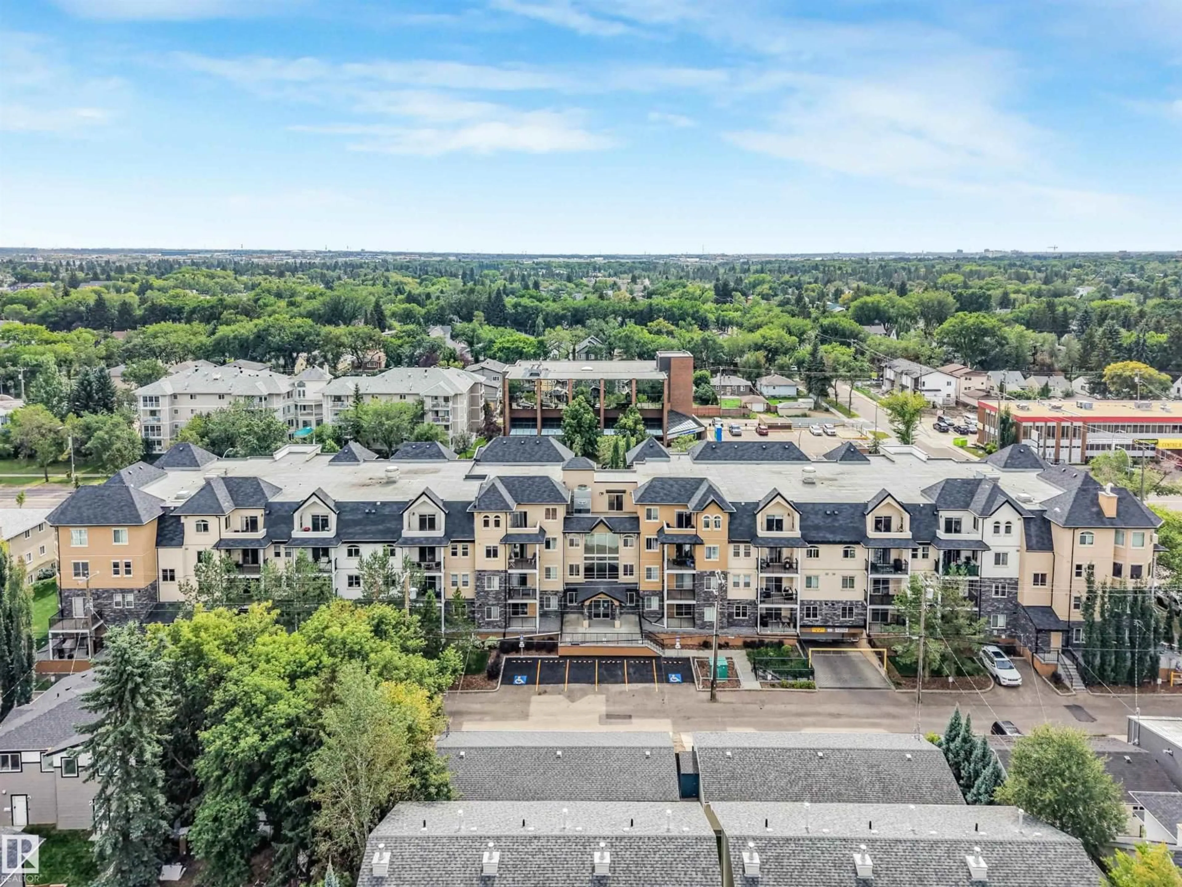 A pic from outside/outdoor area/front of a property/back of a property/a pic from drone, city buildings view from balcony for #214 - 8730 82 AV, Edmonton Alberta T6C0Z1