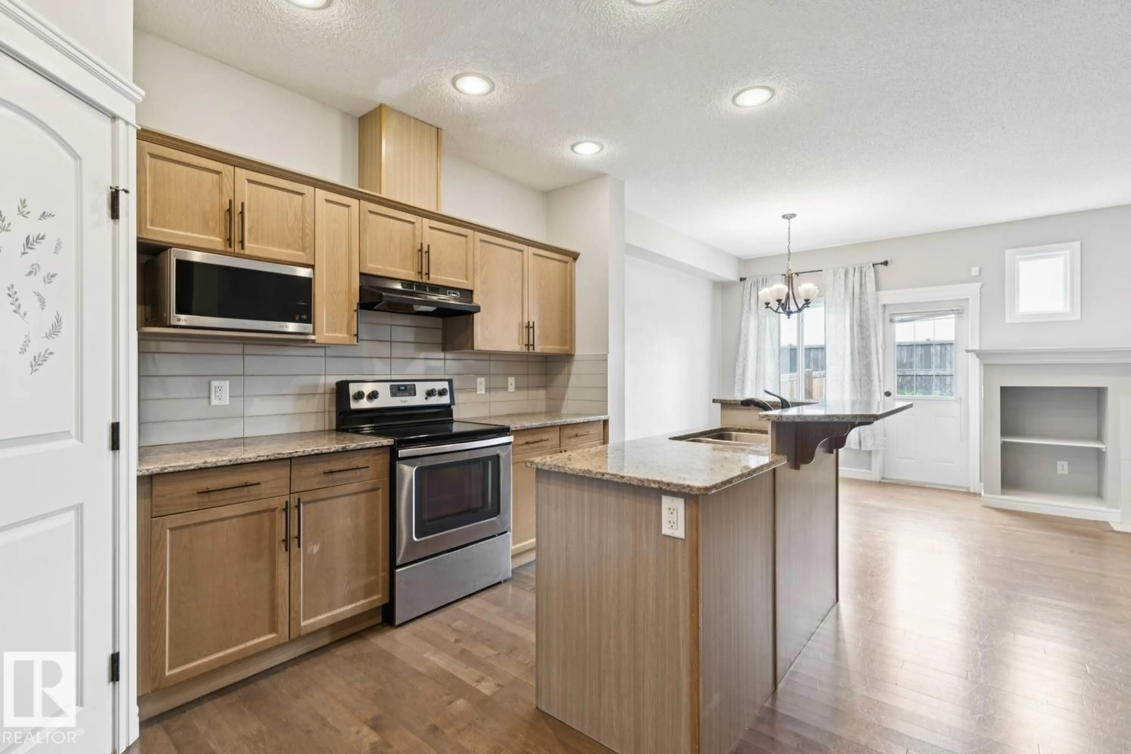 Open concept kitchen, unknown for 17011 38 ST, Edmonton Alberta T5Y3S2