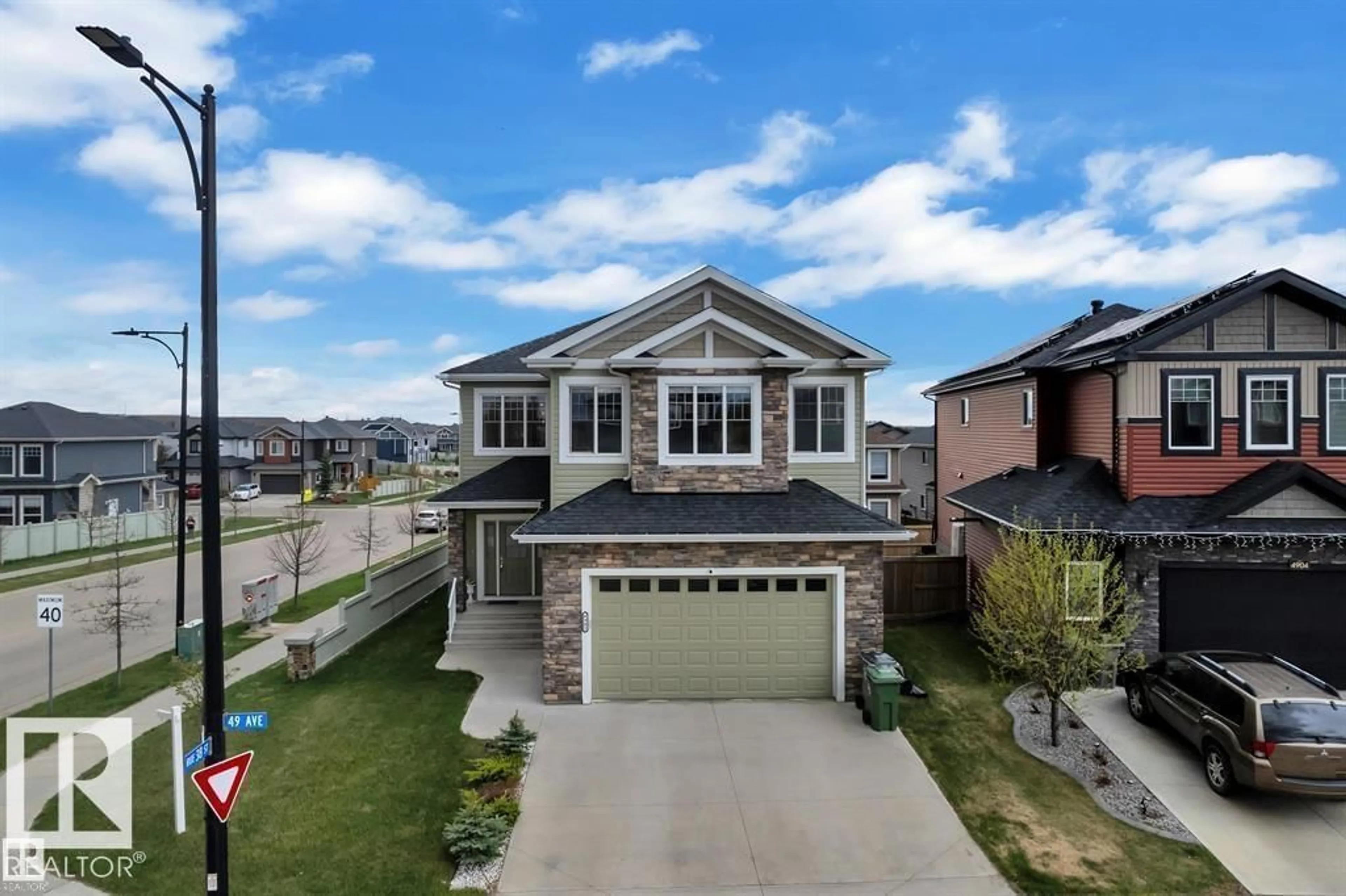 A pic from outside/outdoor area/front of a property/back of a property/a pic from drone, street for 4902 38 ST, Beaumont Alberta T4X2B6