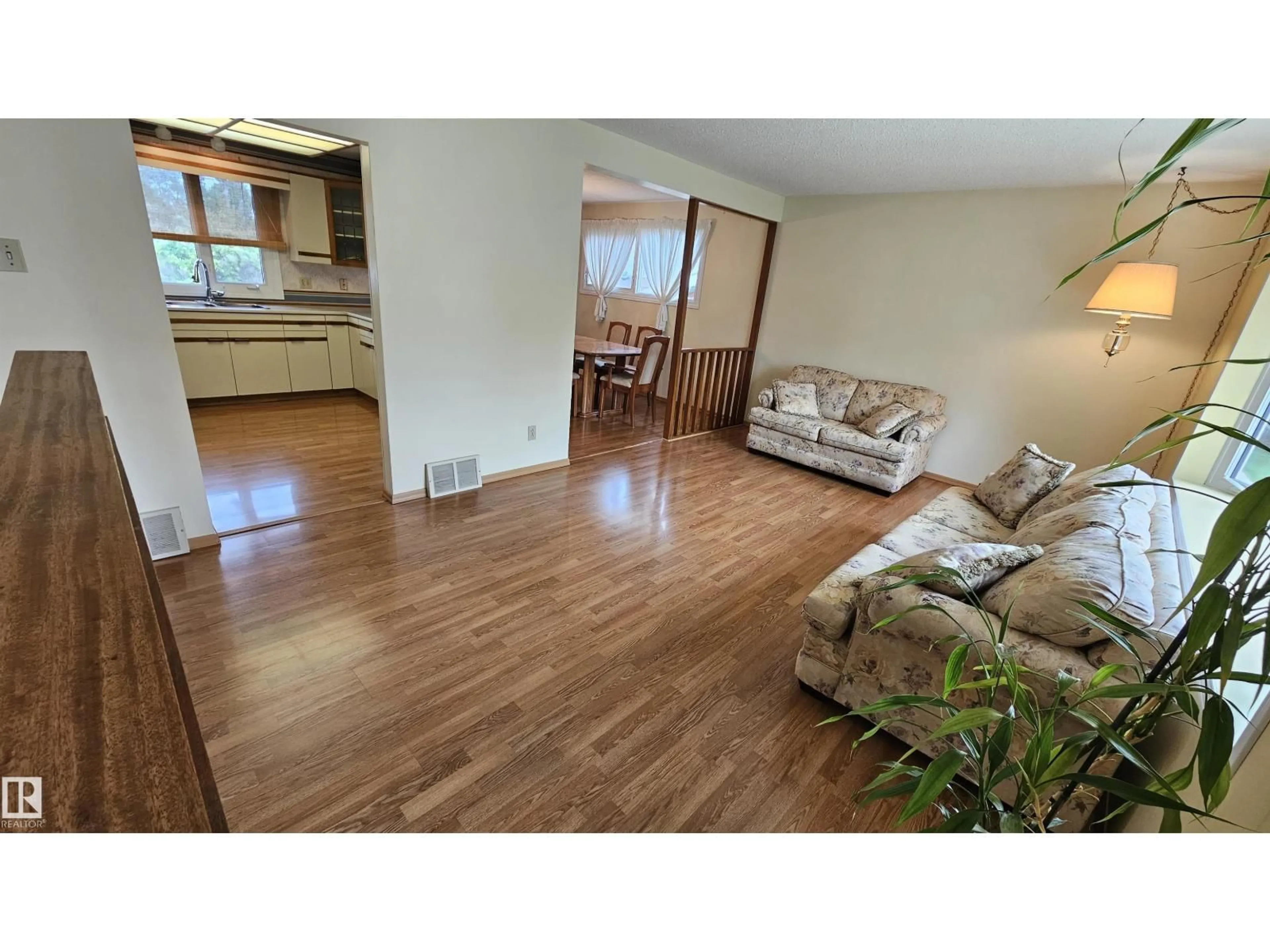 Living room with furniture, wood/laminate floor for 13439 114 ST, Edmonton Alberta T5E5E5