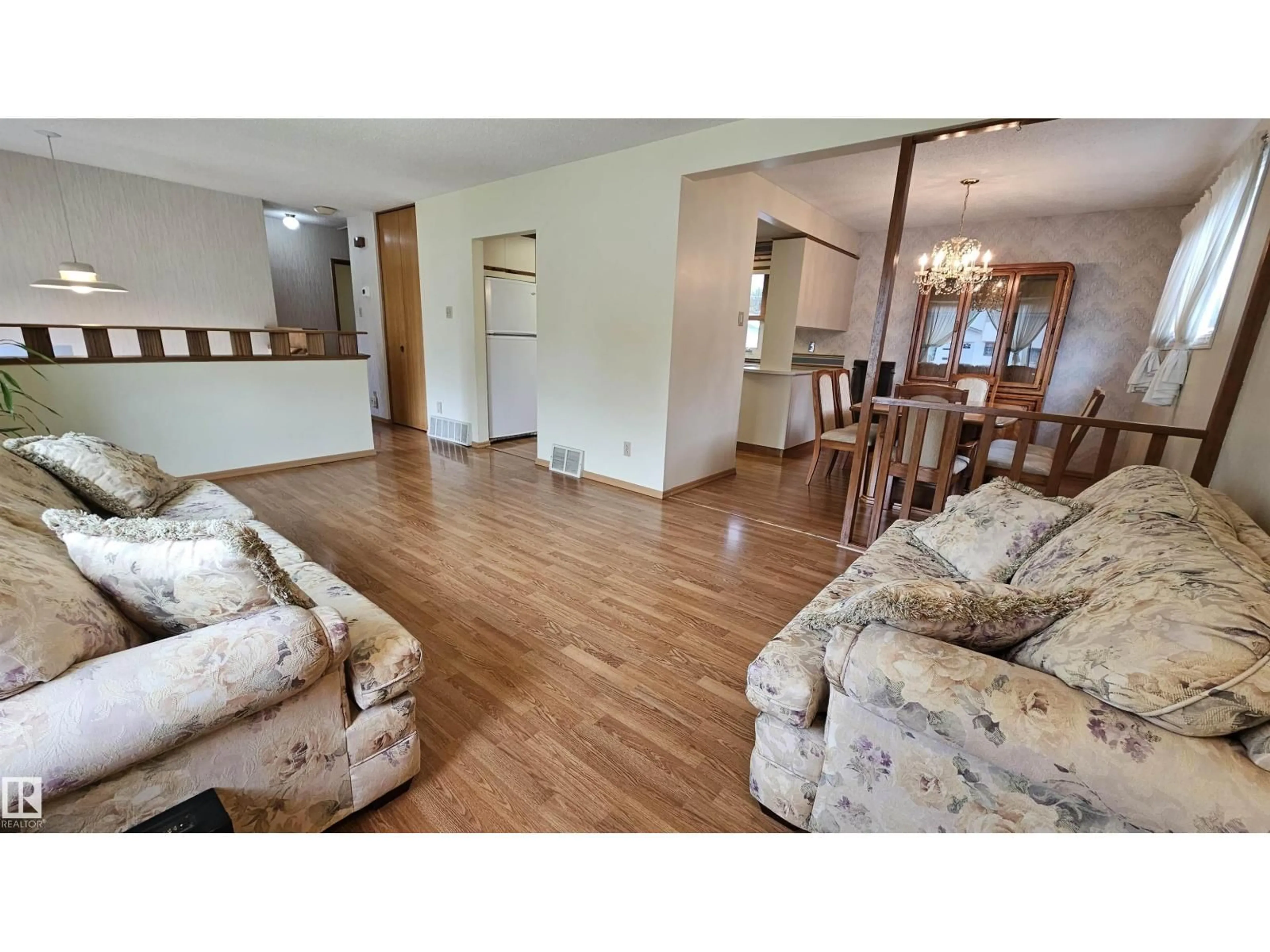 Living room with furniture, wood/laminate floor for 13439 114 ST, Edmonton Alberta T5E5E5