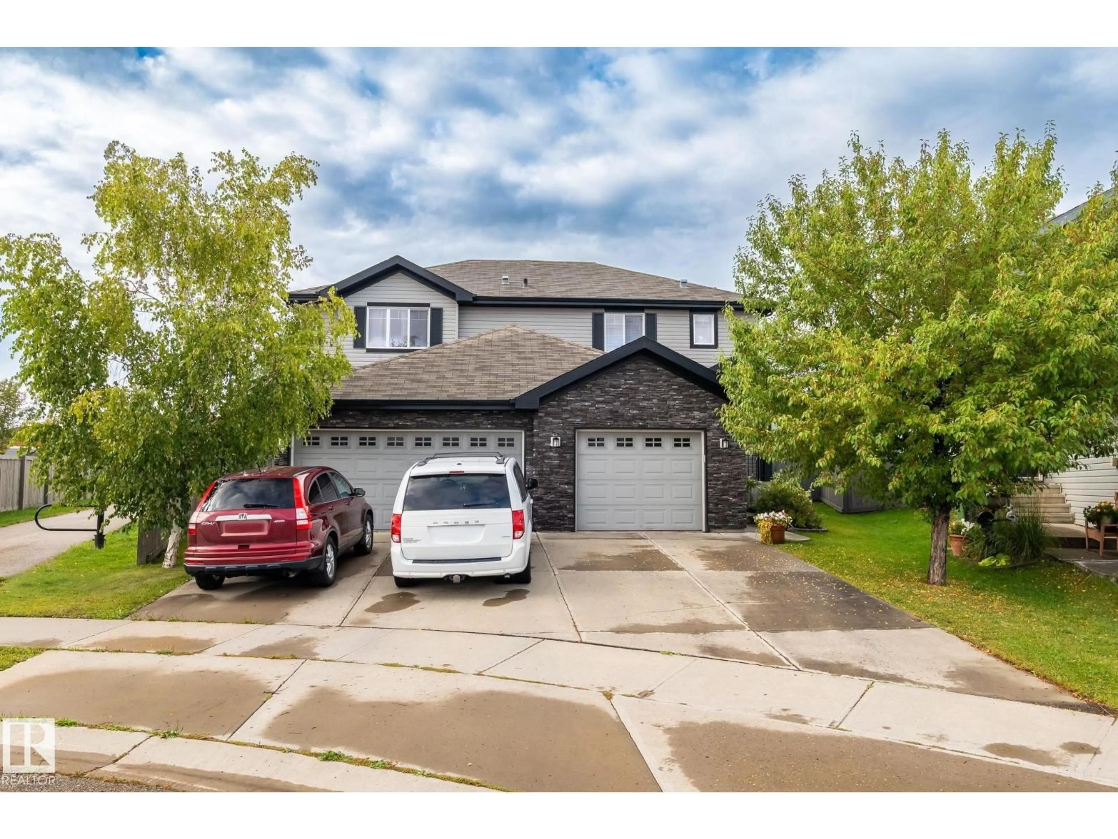 Home with vinyl exterior material, street for 120 CRANSTON PL, Fort Saskatchewan Alberta T8L0K8