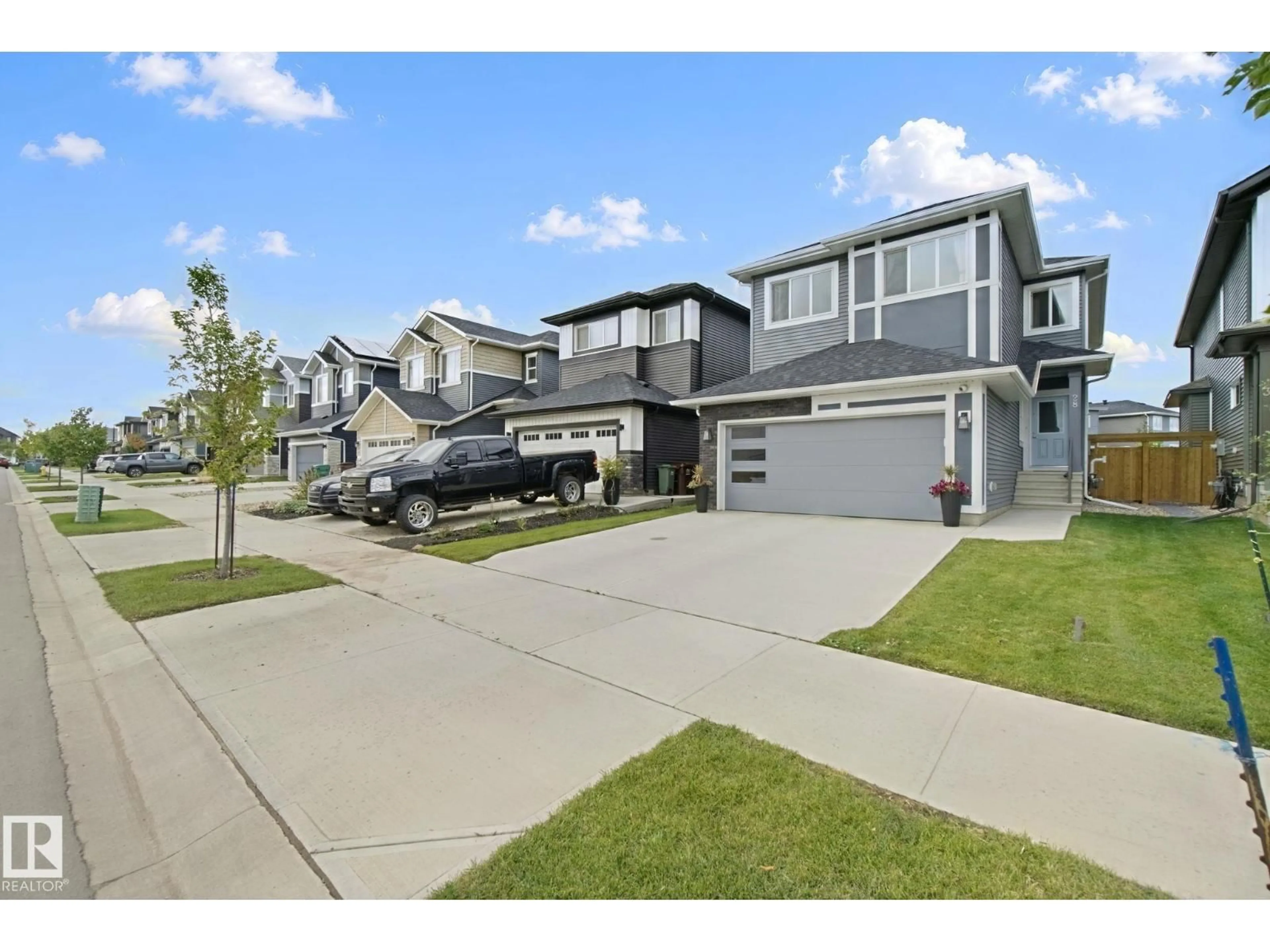 A pic from outside/outdoor area/front of a property/back of a property/a pic from drone, street for 28 ROSEWOOD WY, St. Albert Alberta T8N7Y8
