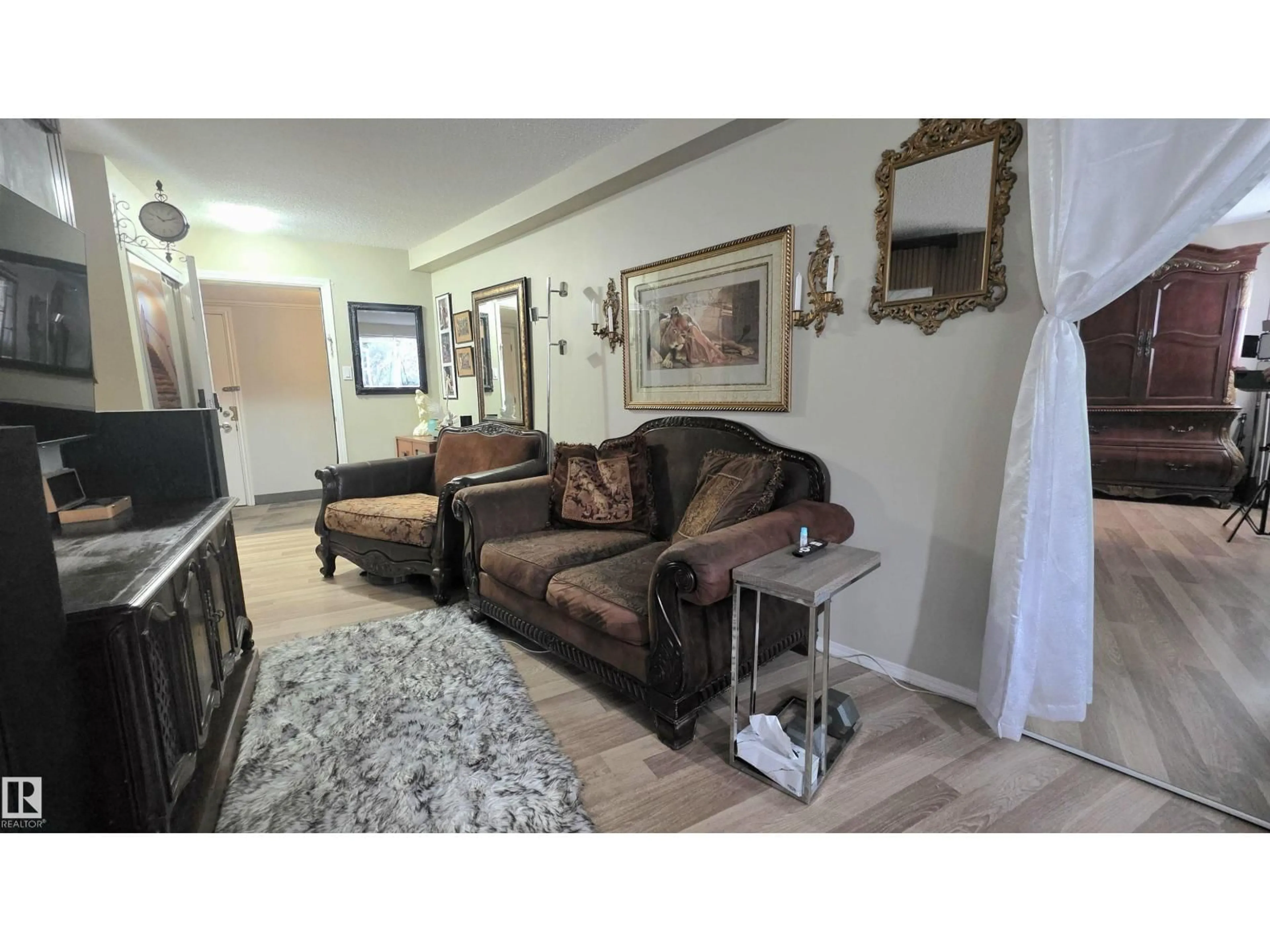 Living room with furniture, unknown for #104 - 8930 149 ST, Edmonton Alberta T5R1B8
