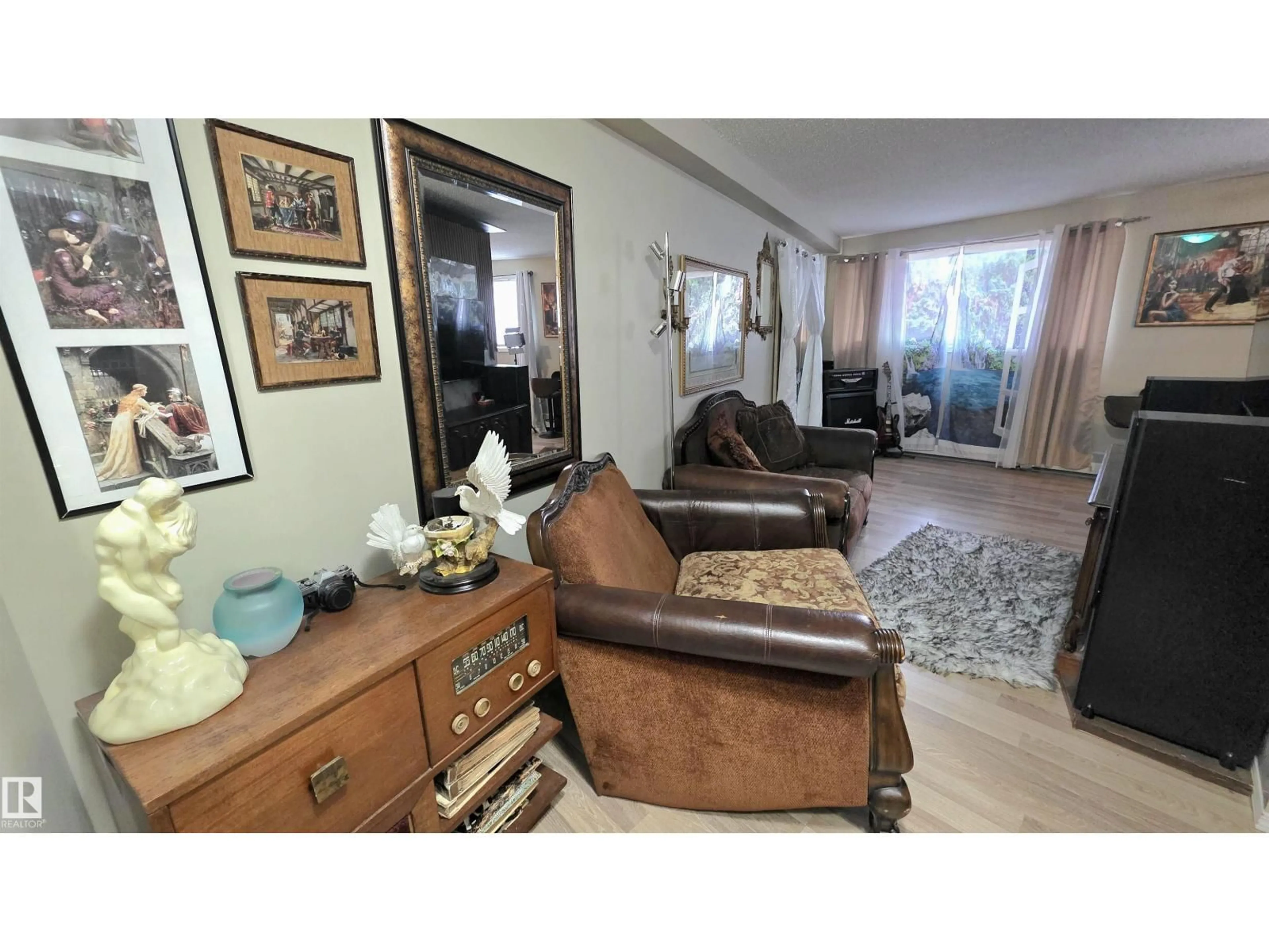 Living room with furniture, unknown for #104 - 8930 149 ST, Edmonton Alberta T5R1B8