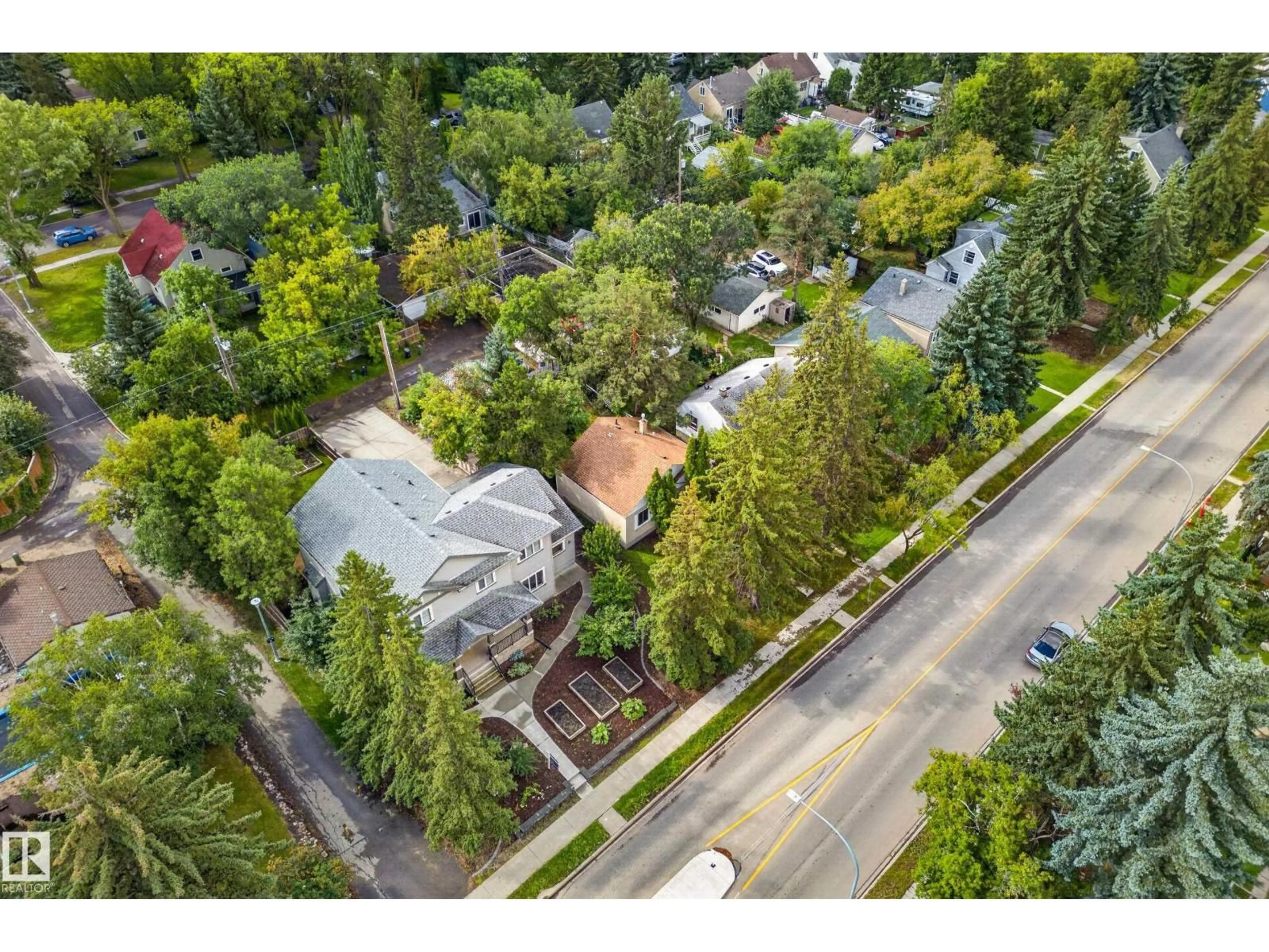 A pic from outside/outdoor area/front of a property/back of a property/a pic from drone, street for 11207 72 AV, Edmonton Alberta T6G0B4