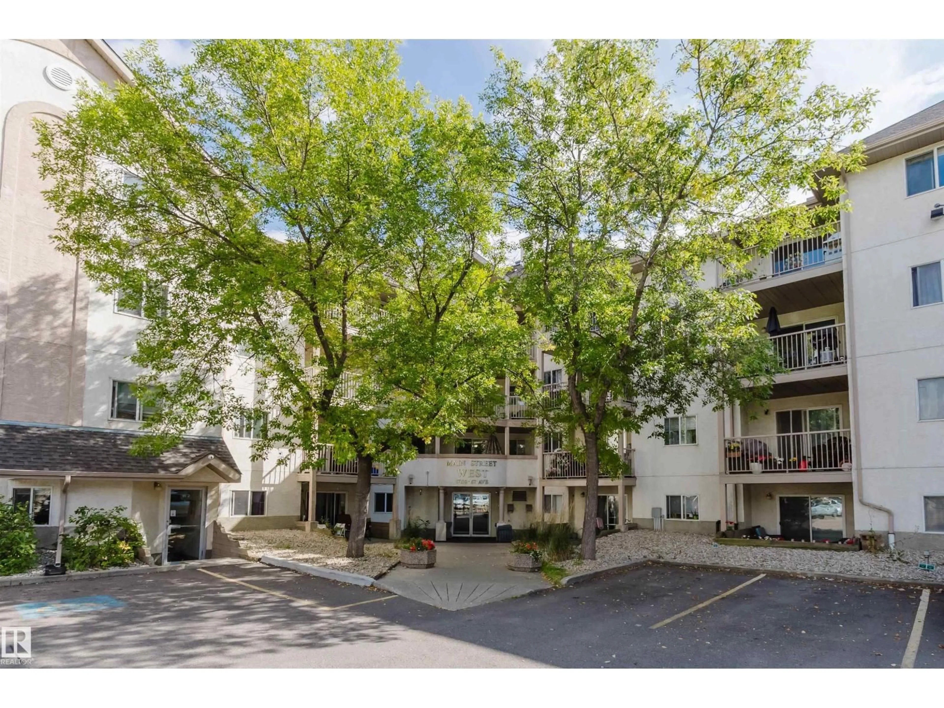 A pic from outside/outdoor area/front of a property/back of a property/a pic from drone, street for 316 17109 67 AV NW, Edmonton Alberta T5T6E6