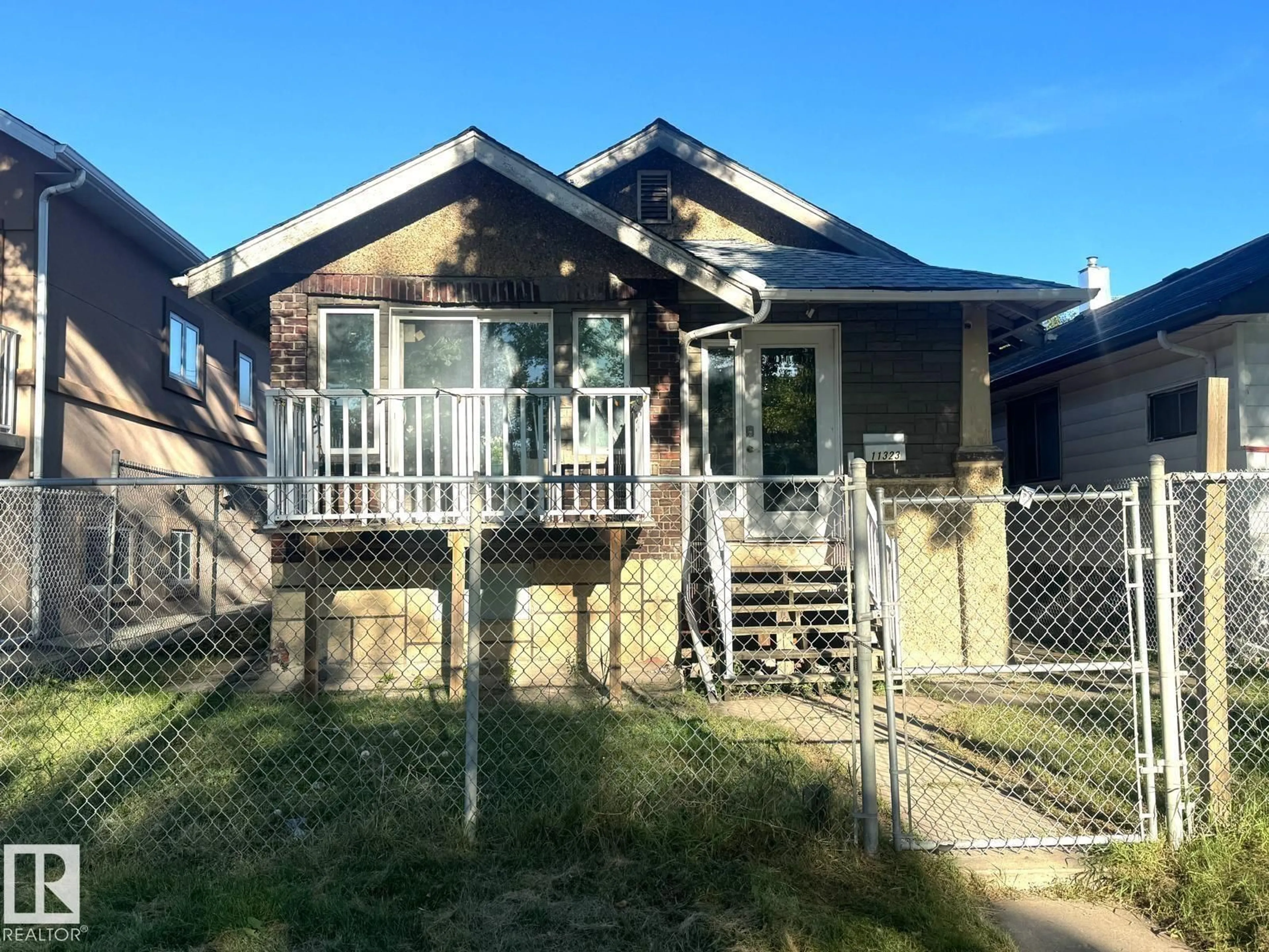 A pic from outside/outdoor area/front of a property/back of a property/a pic from drone, street for NW - 11323 97 ST, Edmonton Alberta T5G1X3