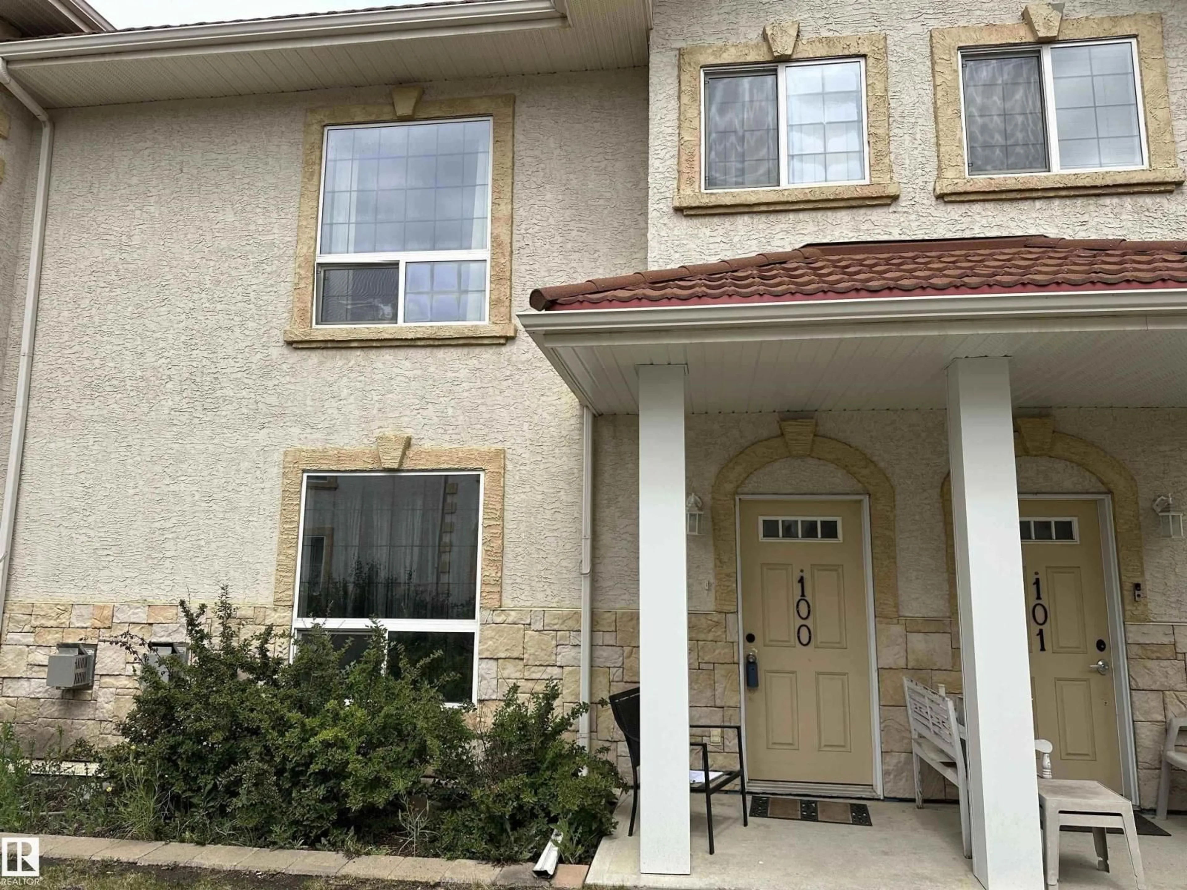 Home with vinyl exterior material, street for #100 - 13825 155 AV, Edmonton Alberta T6V0B8