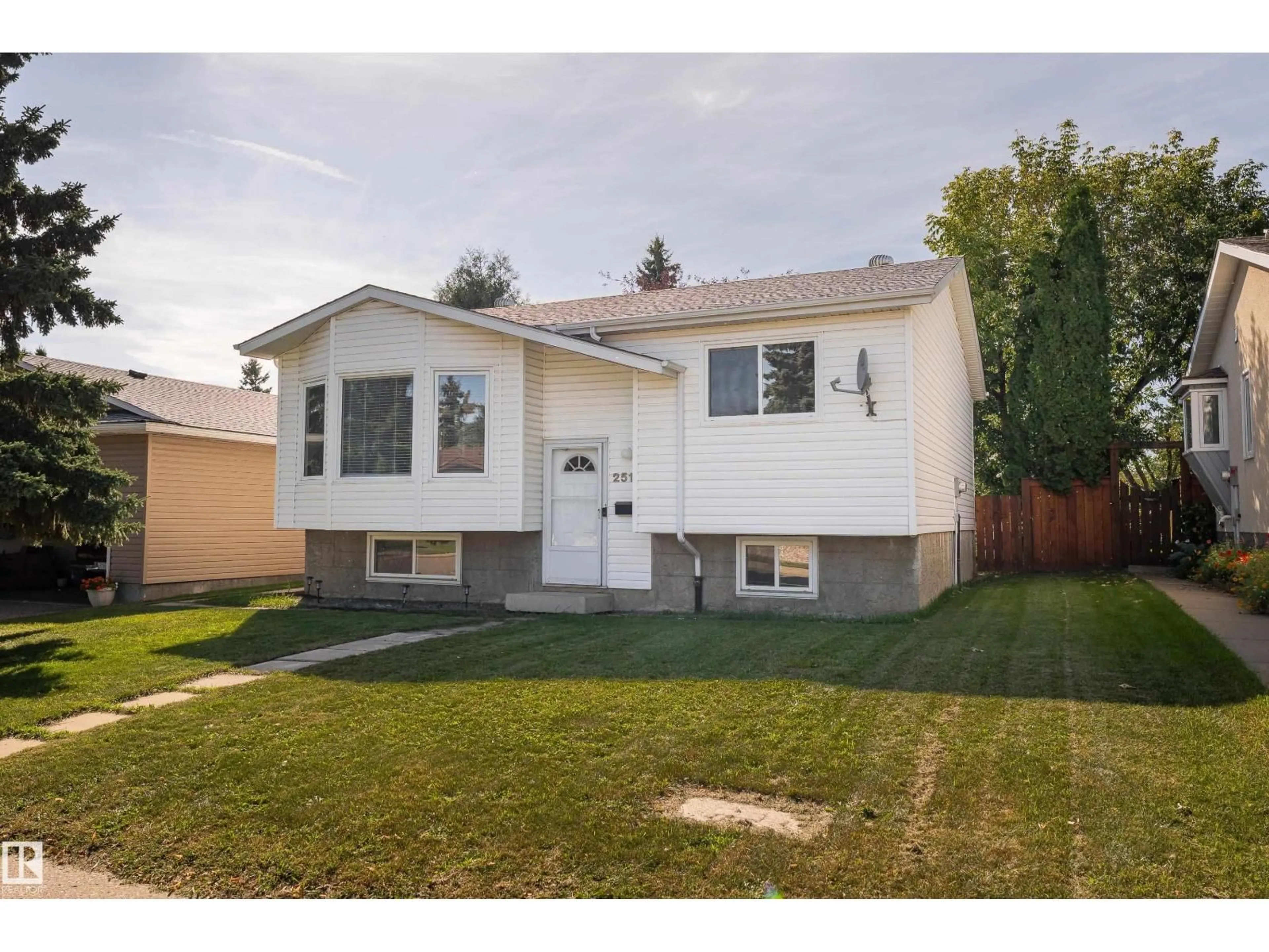 Home with vinyl exterior material, street for 2512 46A ST, Edmonton Alberta T6L3X8