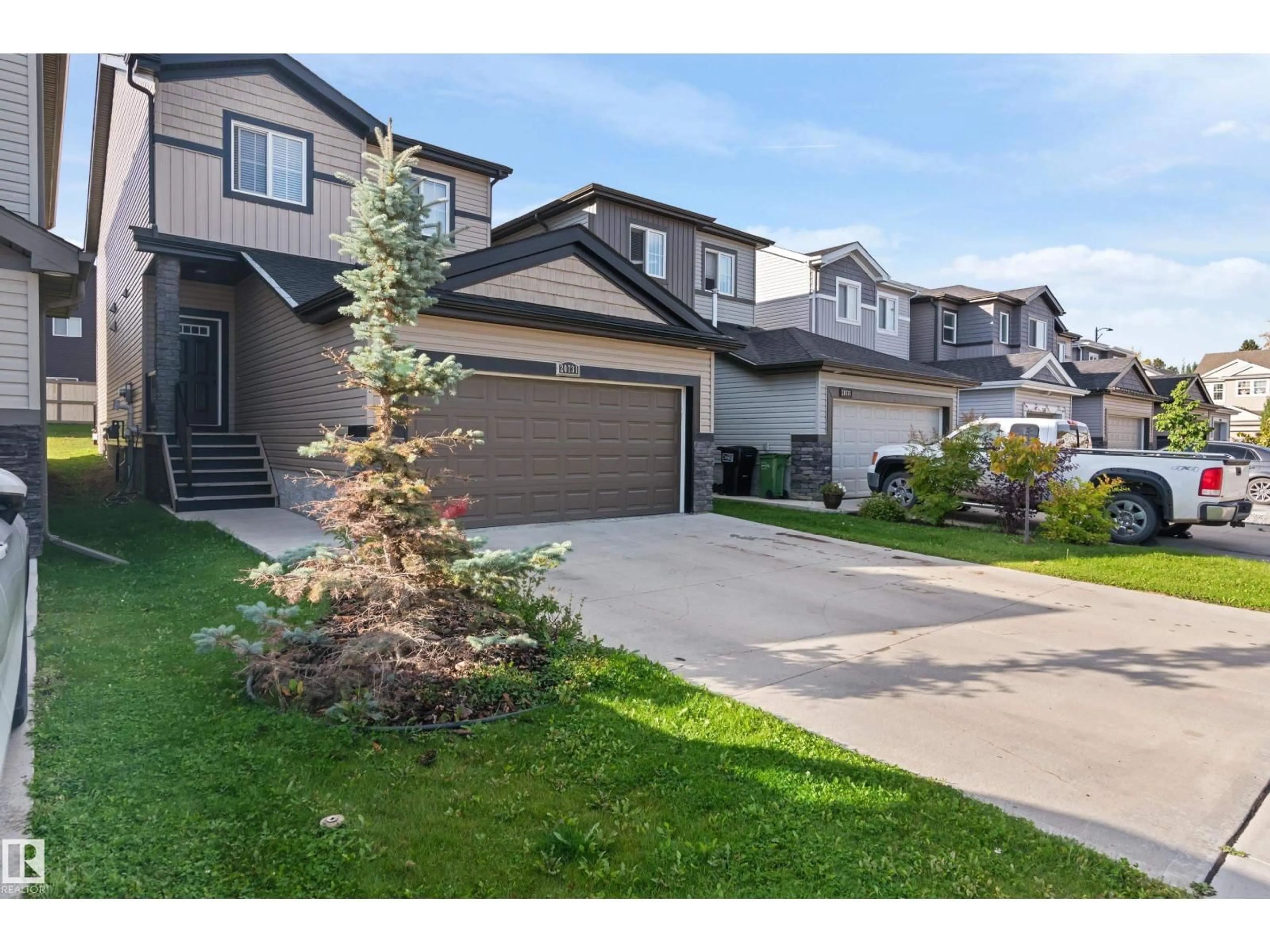 A pic from outside/outdoor area/front of a property/back of a property/a pic from drone, street for 20731 99 AV, Edmonton Alberta T5T7G3