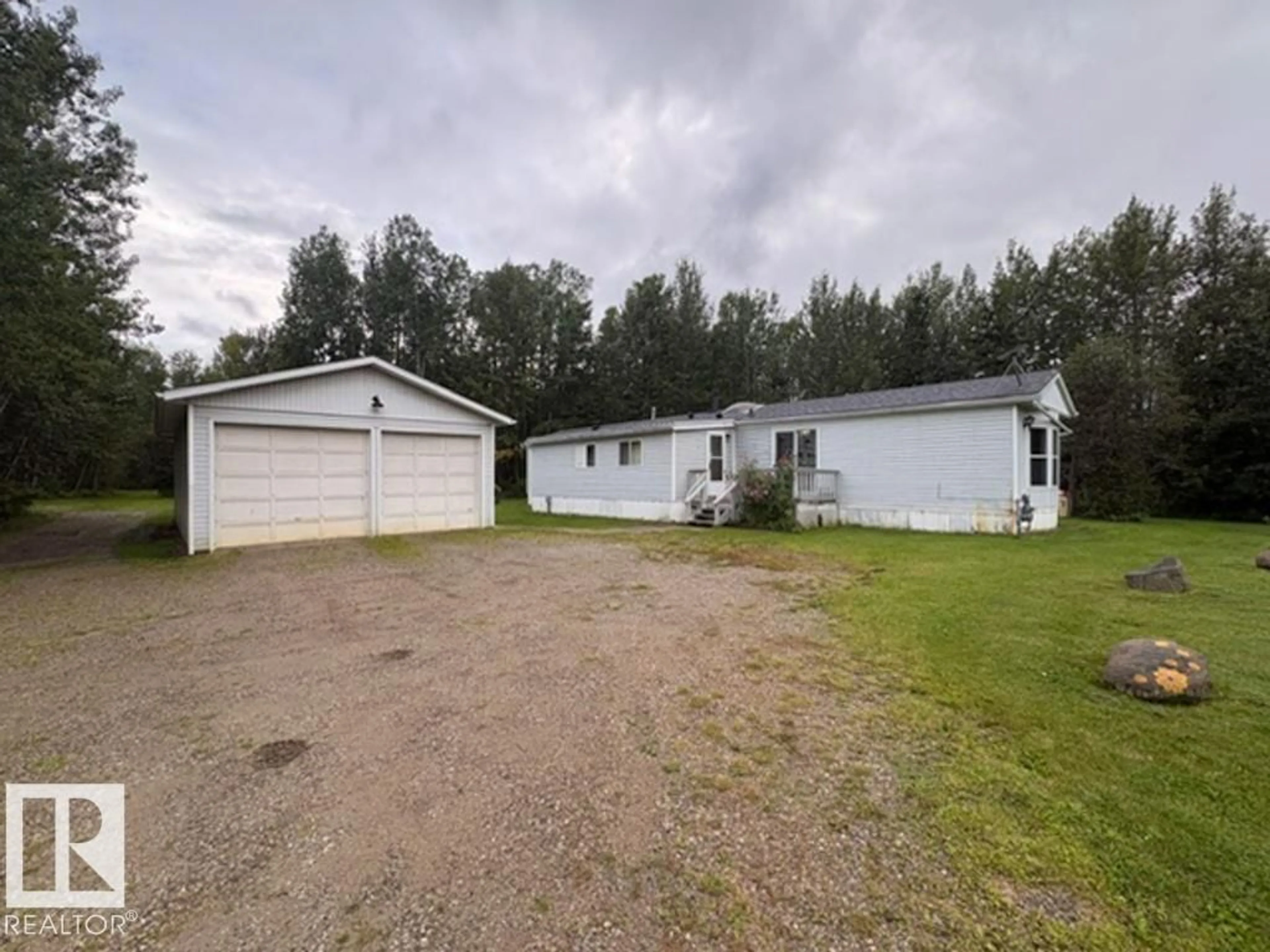 A pic from outside/outdoor area/front of a property/back of a property/a pic from drone, unknown for 54104 - 29 RGE ROAD 35, Rural Lac Ste. Anne County Alberta T0E0A1