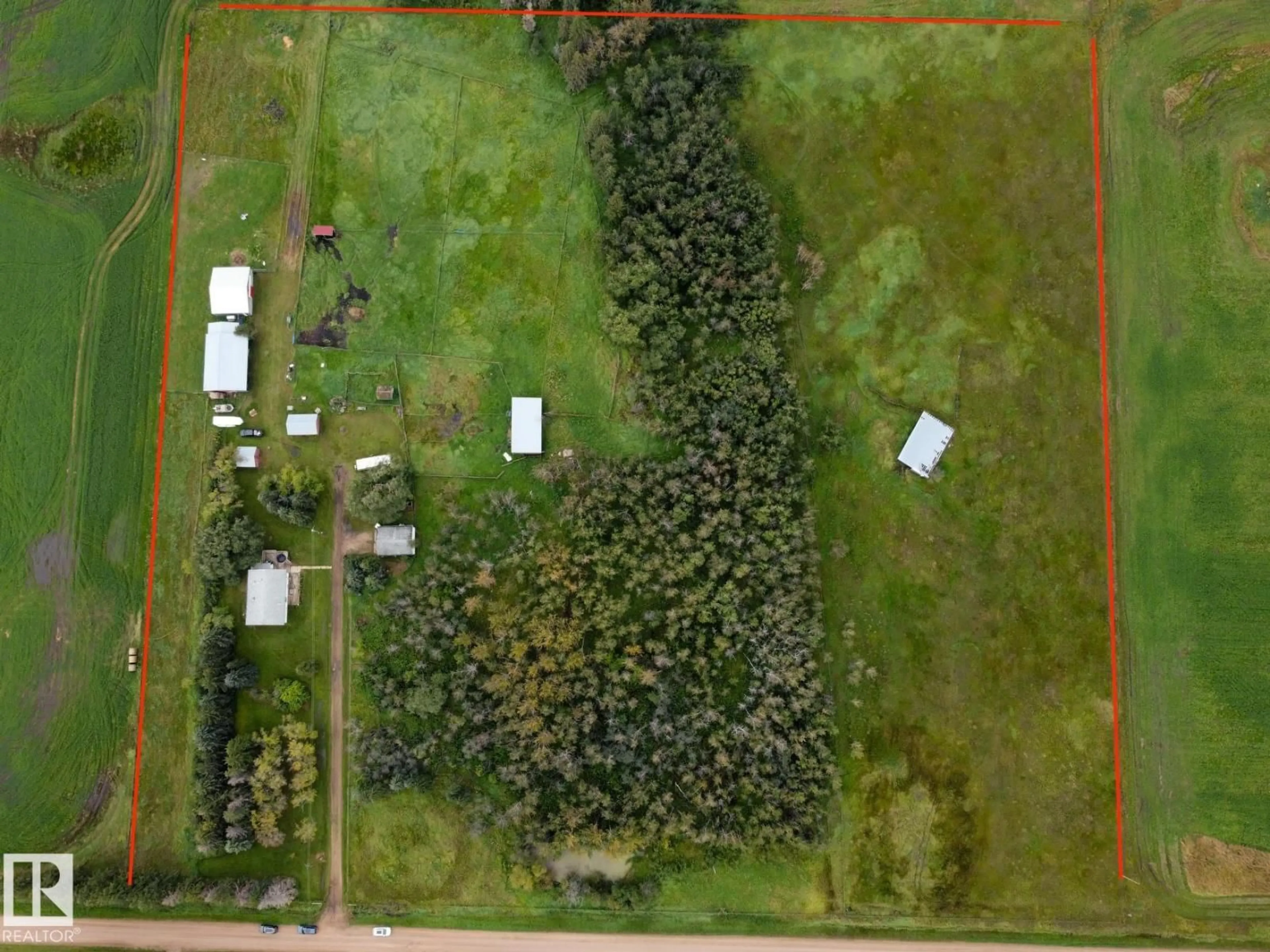 A pic from outside/outdoor area/front of a property/back of a property/a pic from drone, forest/trees view for 57514 RGE RD 223, Rural Sturgeon County Alberta T0A2W0