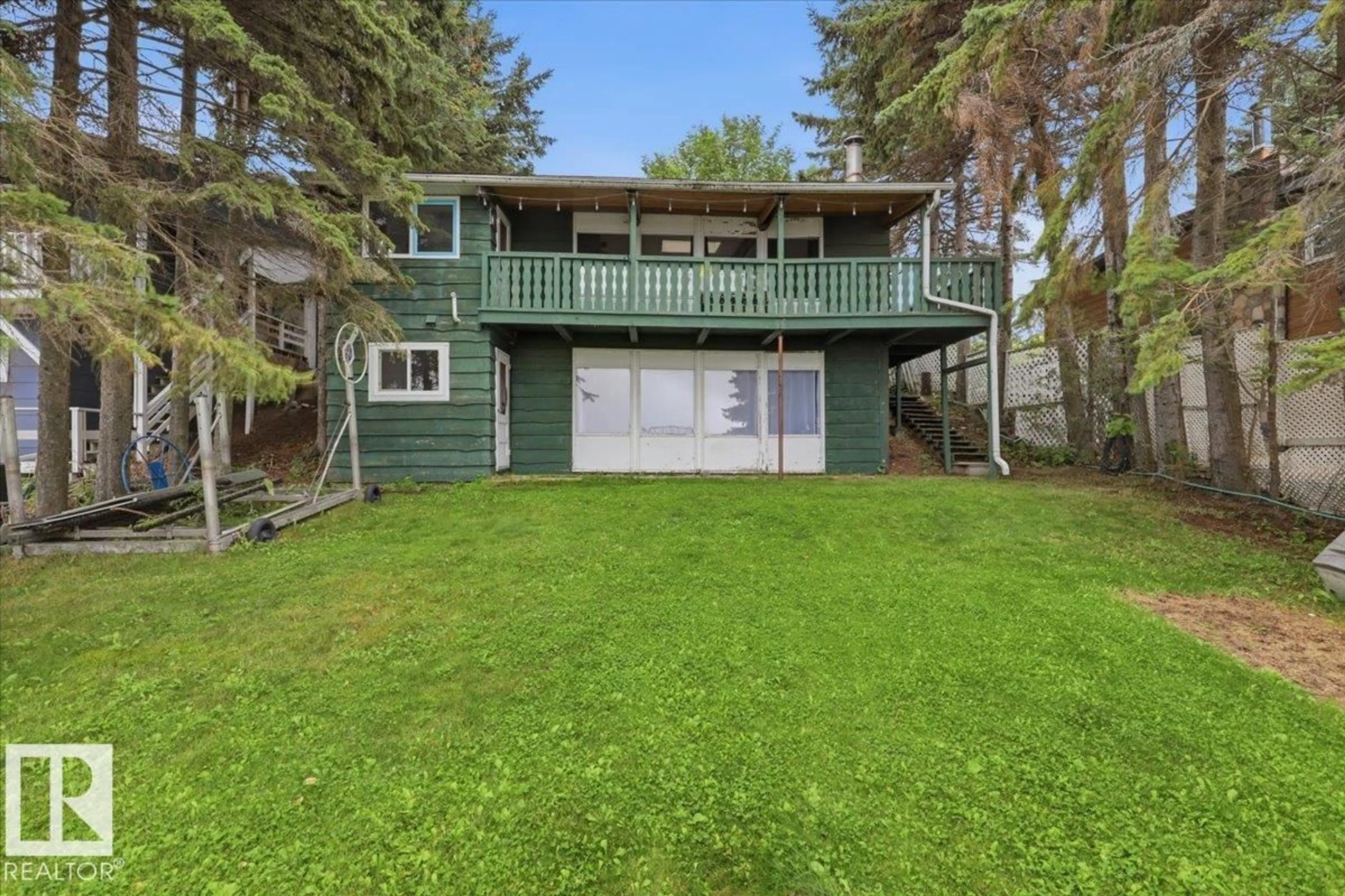 A pic from outside/outdoor area/front of a property/back of a property/a pic from drone, water/lake/river/ocean view for 62 462026 RGE ROAD 10, Rural Wetaskiwin County Alberta T0C2V0